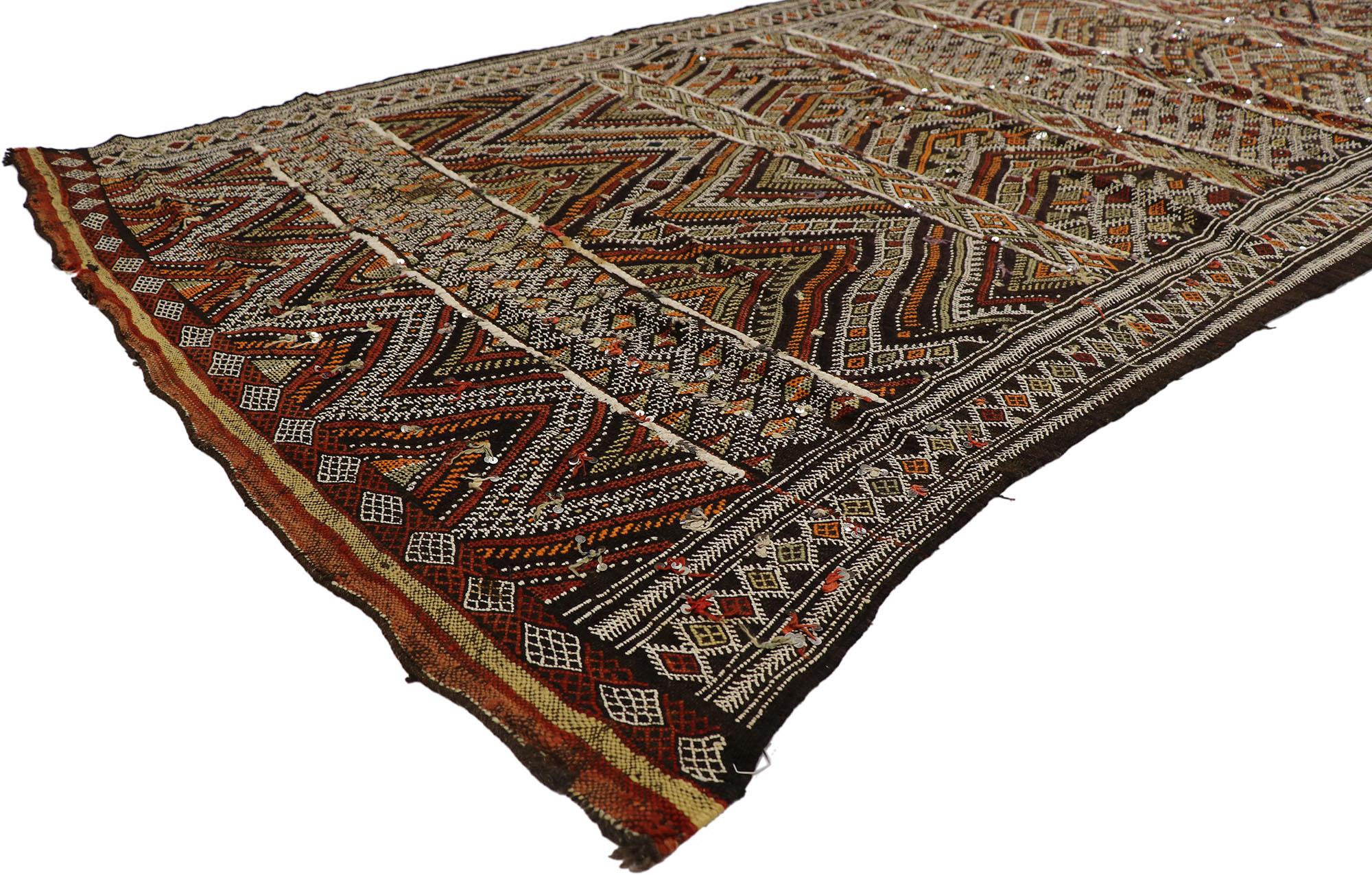 21470 Vintage Zemmour Moroccan Kilim runner with Sequins and Tribal Boho Chic style. Measures: 04'09 x 11'01. Full of tiny details and embellished with sequins combined with earth-tone colors and tribal style, this hand-woven wool vintage Zemmour
