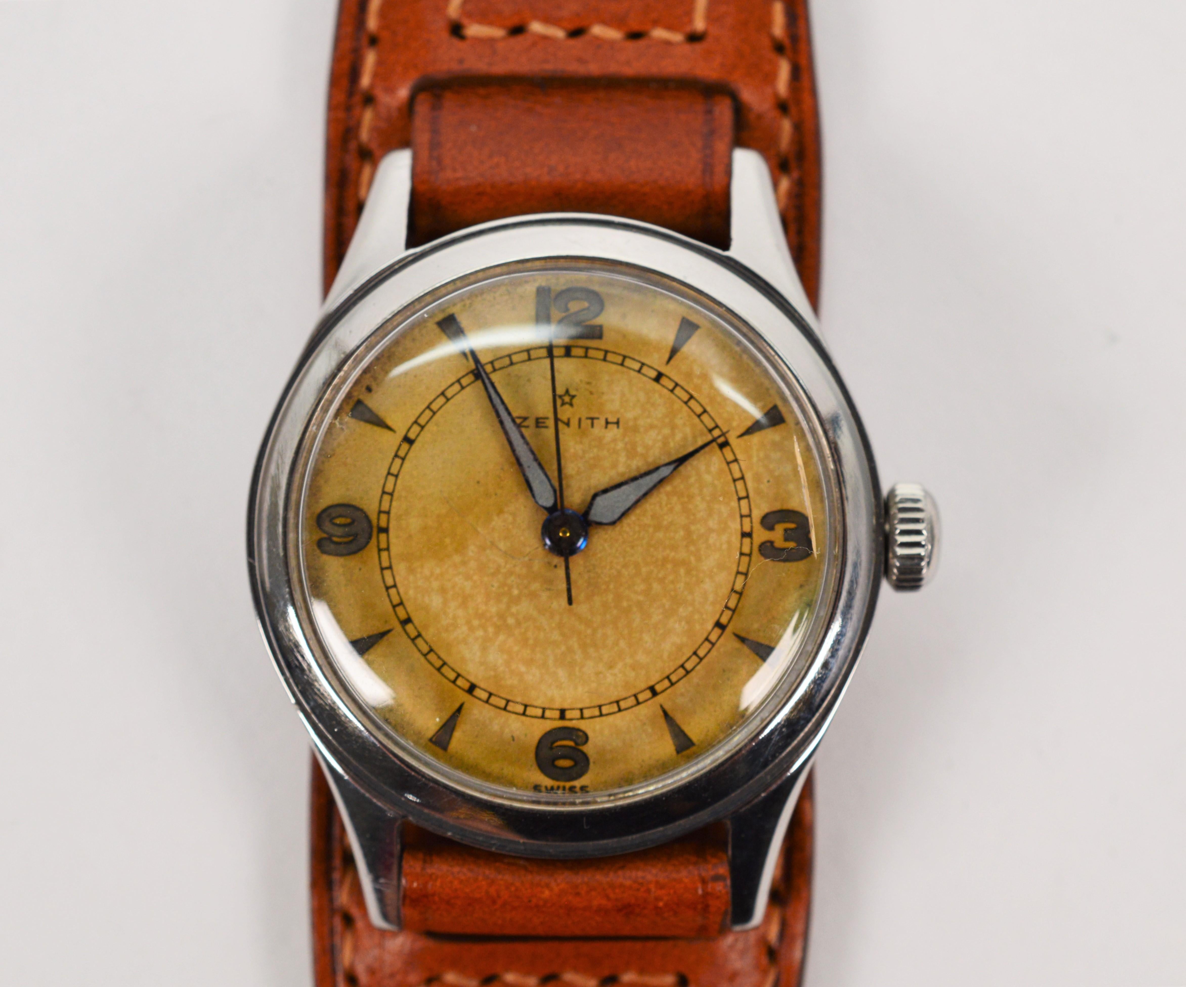 Founded 1865,  Zenith Watch Co has been known for its precision timepieces. Enjoy this great mid 1940's model 3600584 Wrist Watch in pristine vintage condition. With a 31mm brushed steel case 8510554, this smart looking Zenith watch sports its