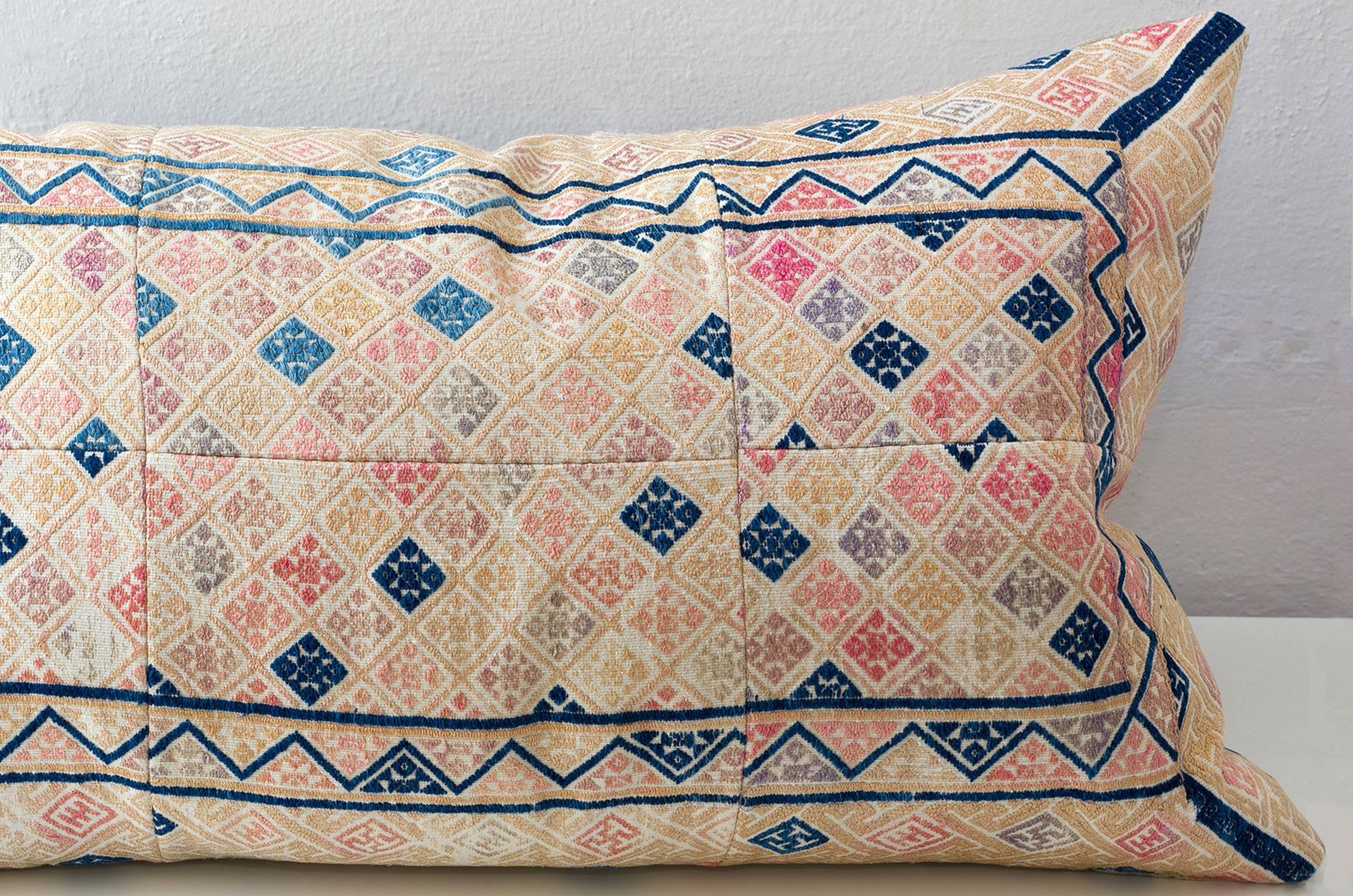 Zhuang piecework cushion in pinks with indigo border frame.

Linen on reverse.
75/25 goose feather and down inserts.
Concealed zippers.
Please inquire for pillows in coordinating fabrics.