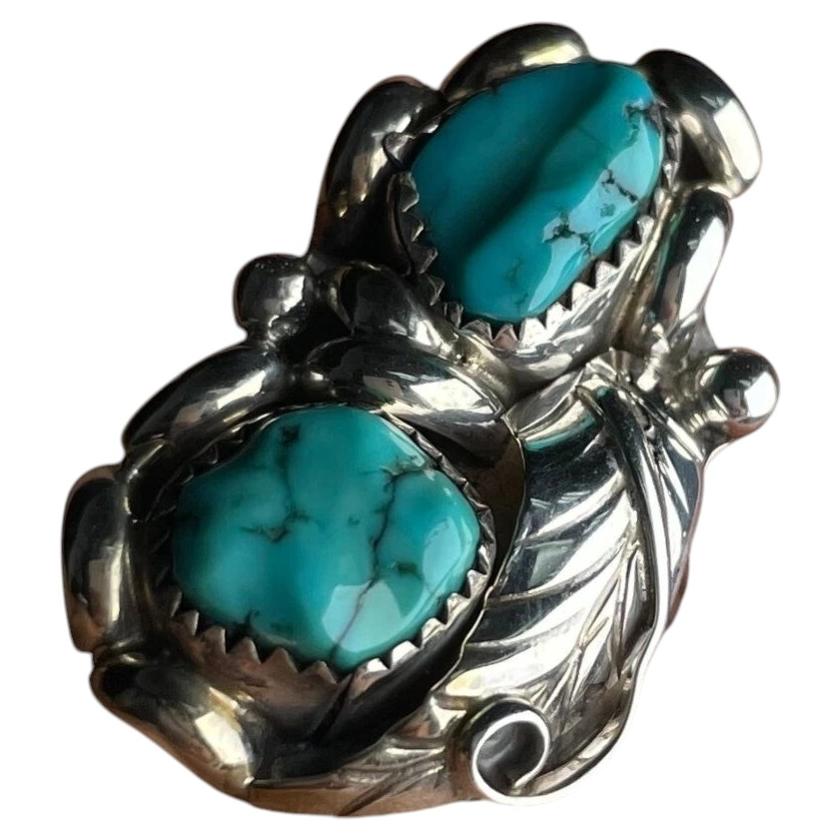 Bague vintage ZIA Navajo de style western en argent massif, ornée d'une turquoise bleue aux reflets plumeux, 7,8 g