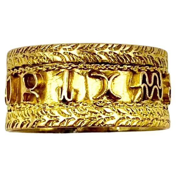 Anillo vintage de oro amarillo de 14 quilates con símbolos del zodiaco de los años 70 en venta