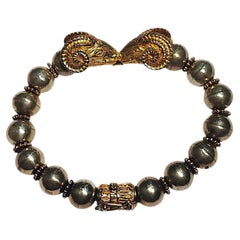 Pulsera vintage de Zolatas con cabeza de cabra en oro y plata