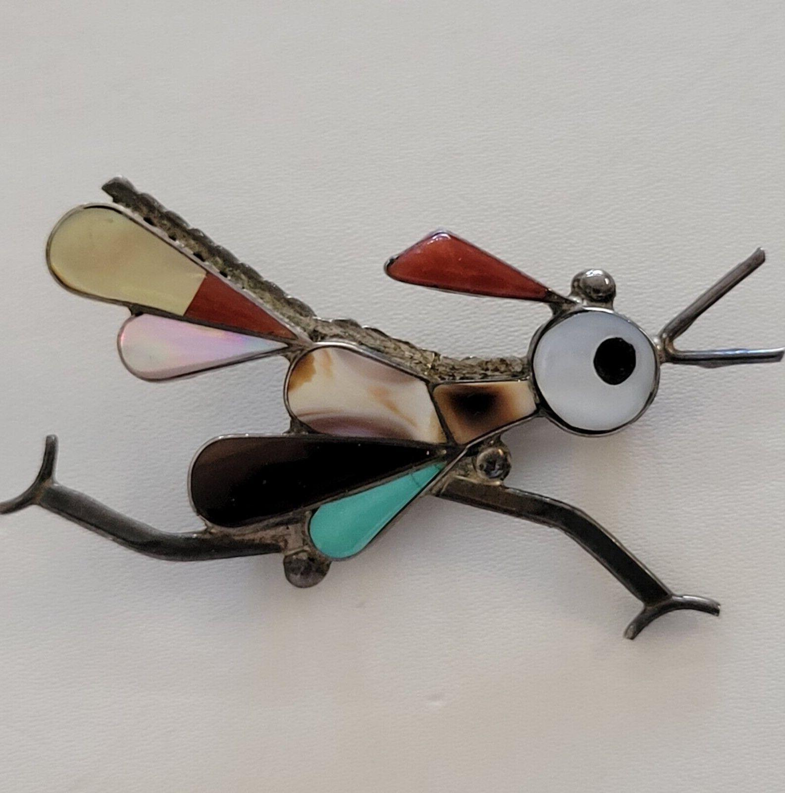 Simply Delightful! Vintage Mid Century Modern ZUNI Roadrunner Turquoise and Sterling Silver Pendant Brooch Pin. Hand crafted in Sterling Silver and Hand set with Turquoise and assorted Stones. Measuring approx. 2.” tall and wide. More Wonderful in