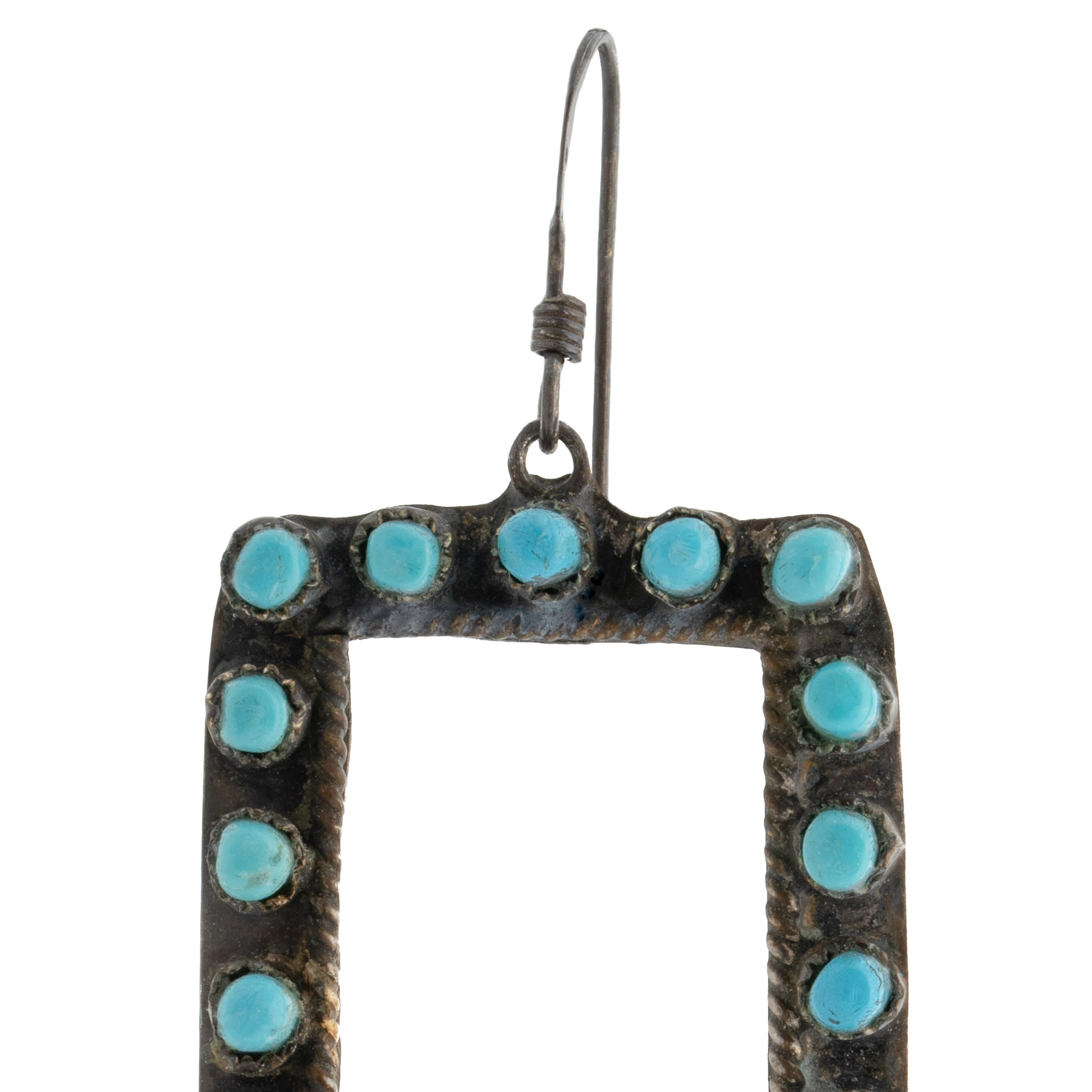 Vintage Zuni Silver and Turquoise Square Fringe Earrings c.1970s

Each earring weighs 4.7 grams
Length: 2.65 inches
Width: 0.88