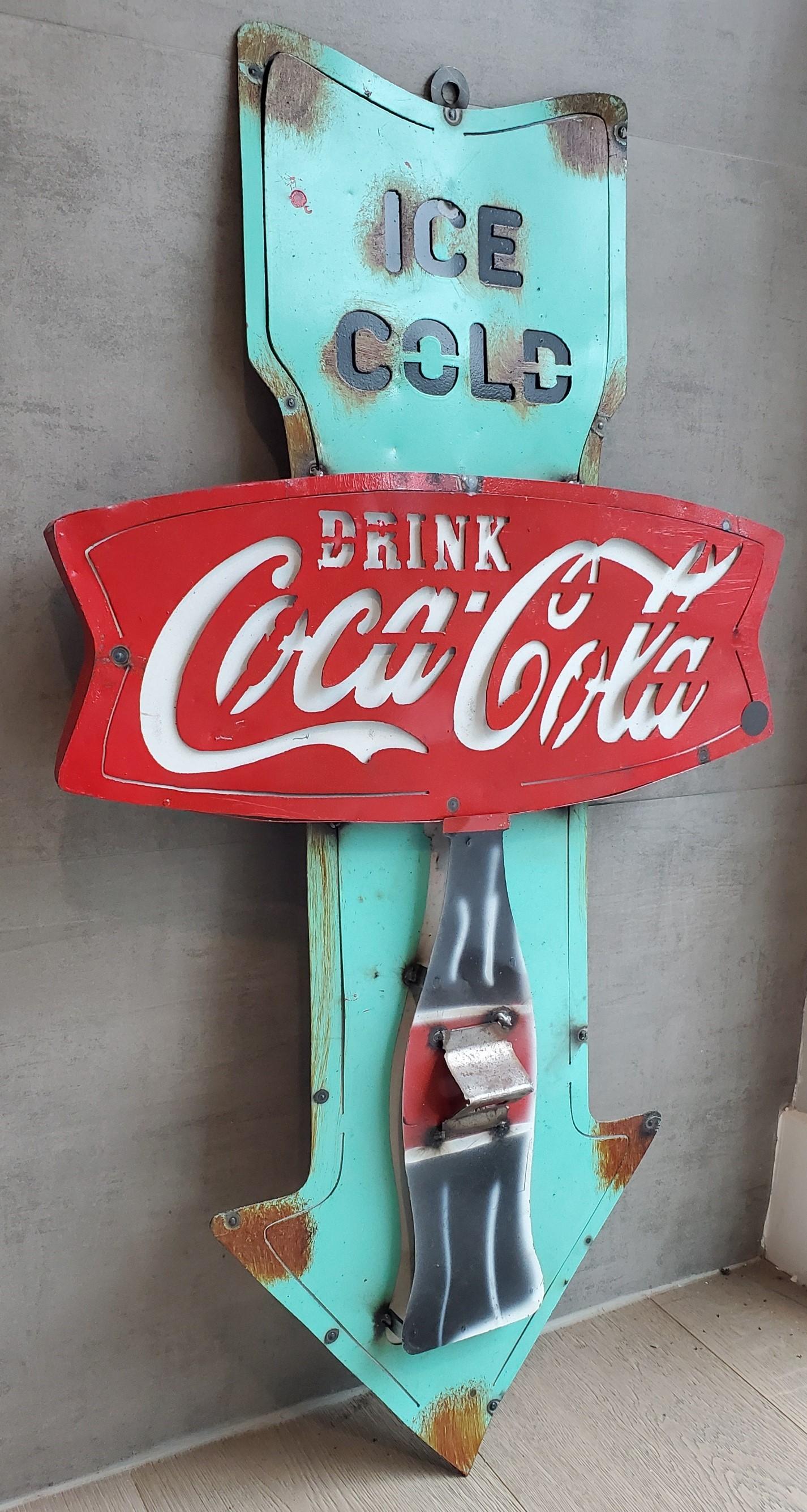 Vintage 1950s coca cola wall hinging bottle opener sign.
