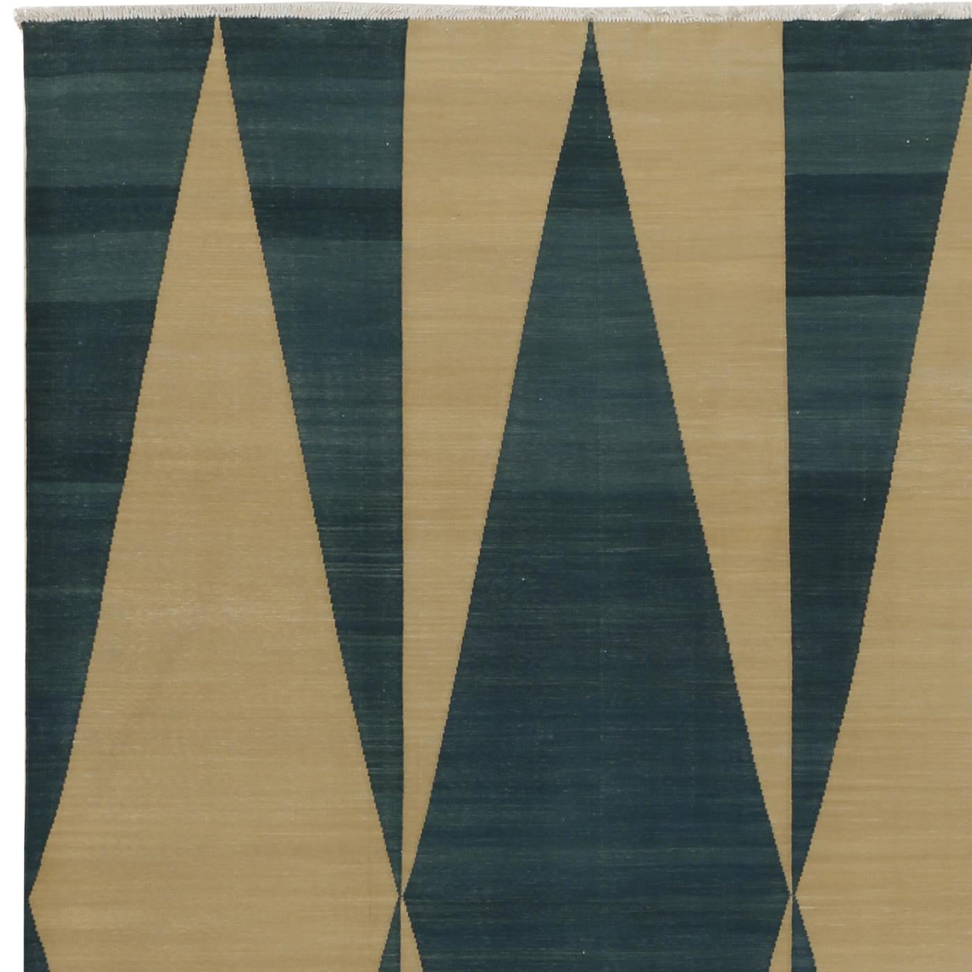 This hand-woven cotton carpet has a flat-weave and was dyed using natural pigments. Designed by Barbara Frua De Angeli exclusively for Alberto Levi Gallery, this piece features a modern decorative pattern made of three elongated diamonds in a