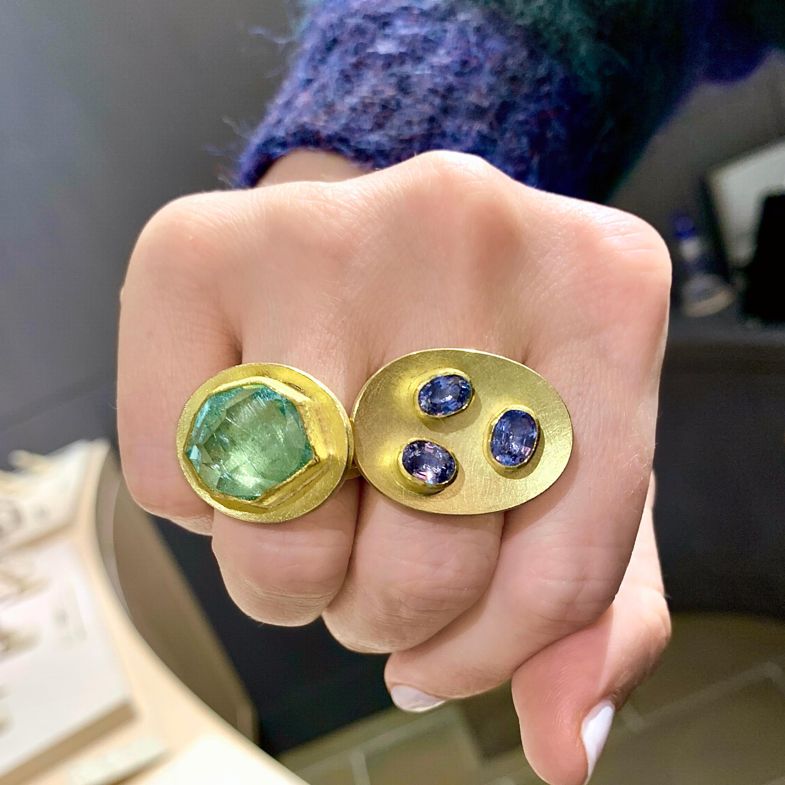 One of a Kind Dish Ring handmade by acclaimed jewelry artist Petra Class featuring three faceted violet blue sapphire ovals individually bezel-set in the maker's signature 22k yellow gold atop a 18k yellow gold oval dish with a 18k gold split wire