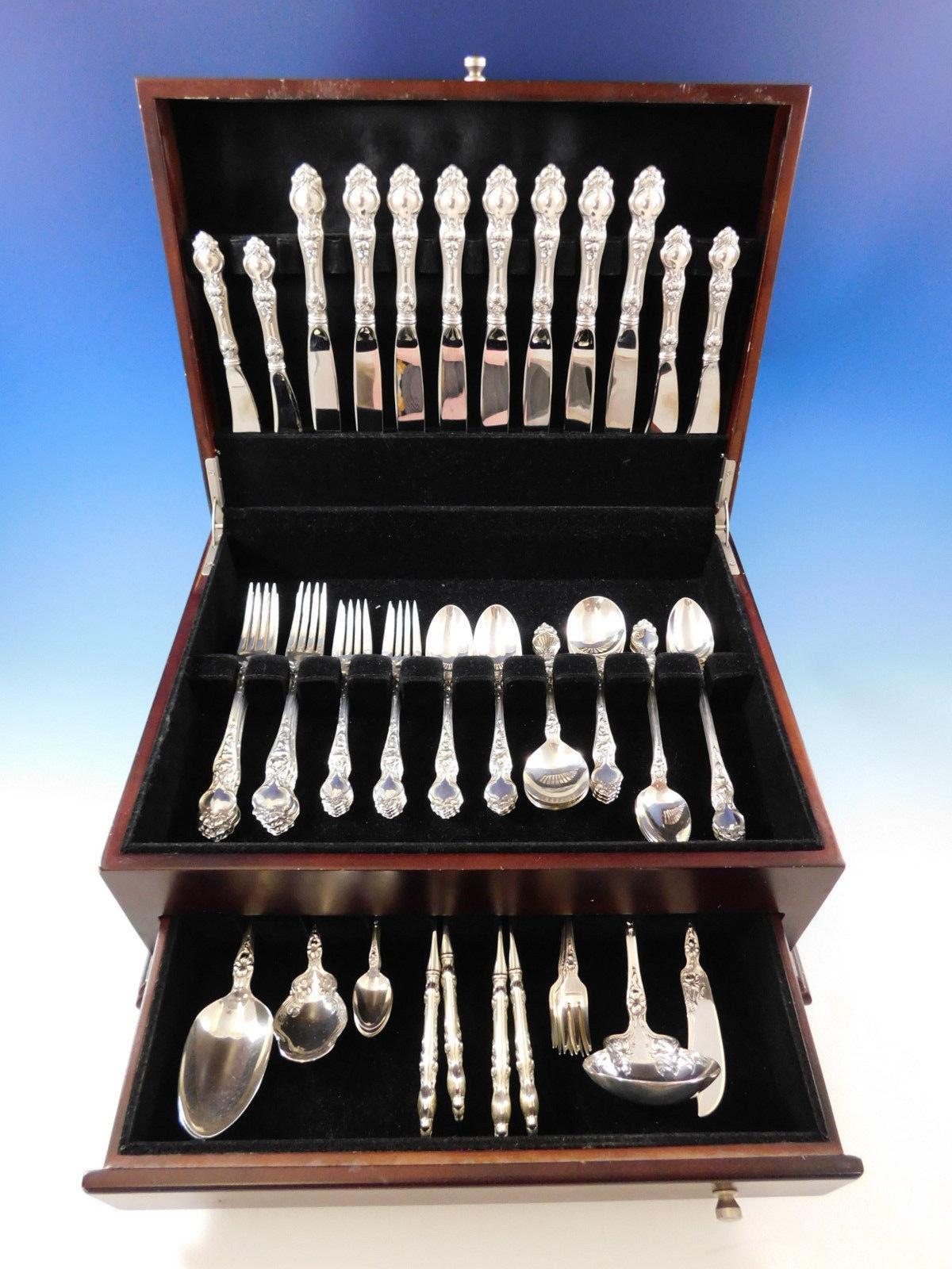 Stunning Violet by Wallace sterling silver flatware set - 77 pieces. This set includes:

8 knives, 8 7/8