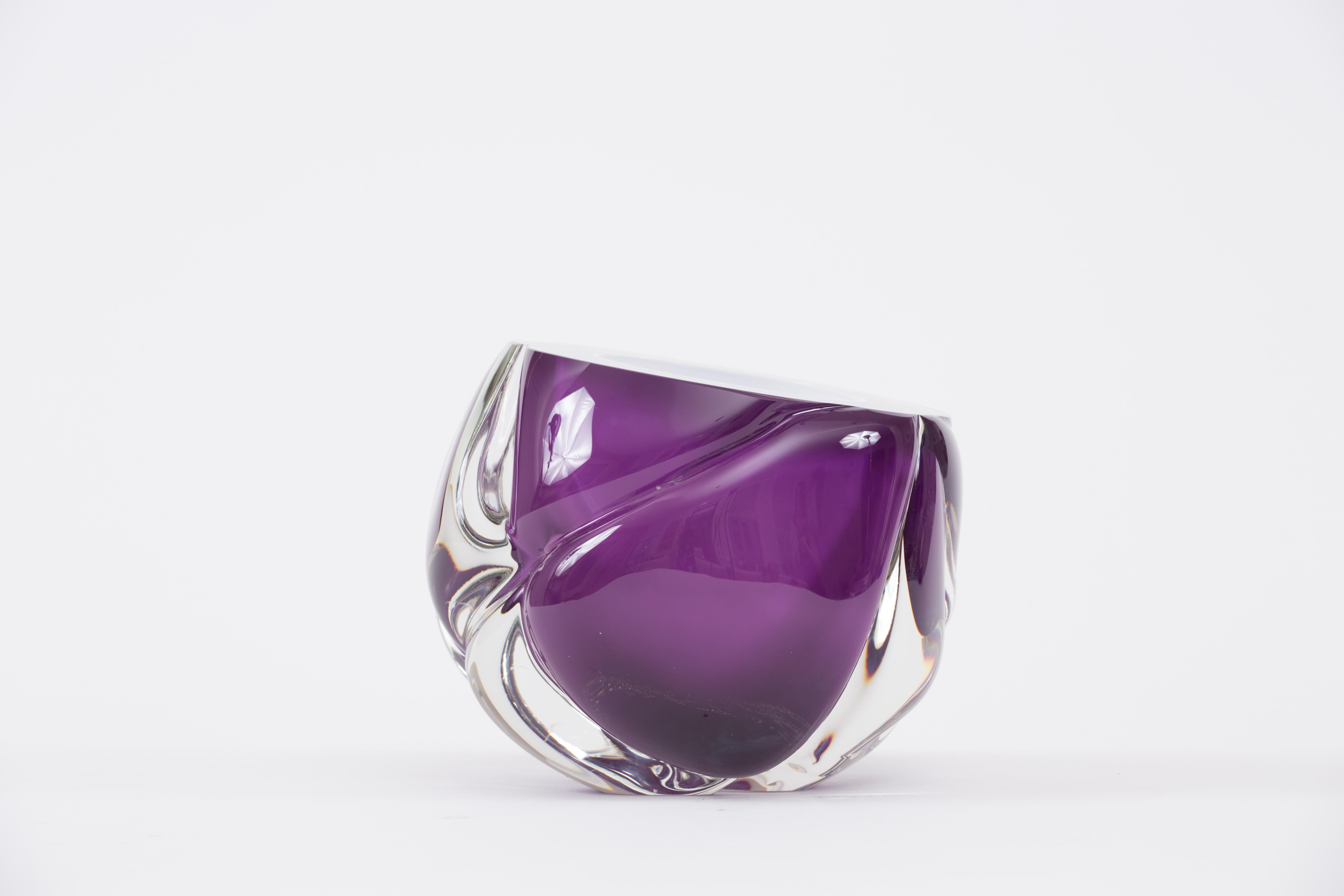 Hand blown glass

‘Cut’ came from a series of experimentation by playing with the thickness and the surface of the hot glass to create a rippling effect. Inspired by the glistening waves of the seas, we wanted to capture the same effect of