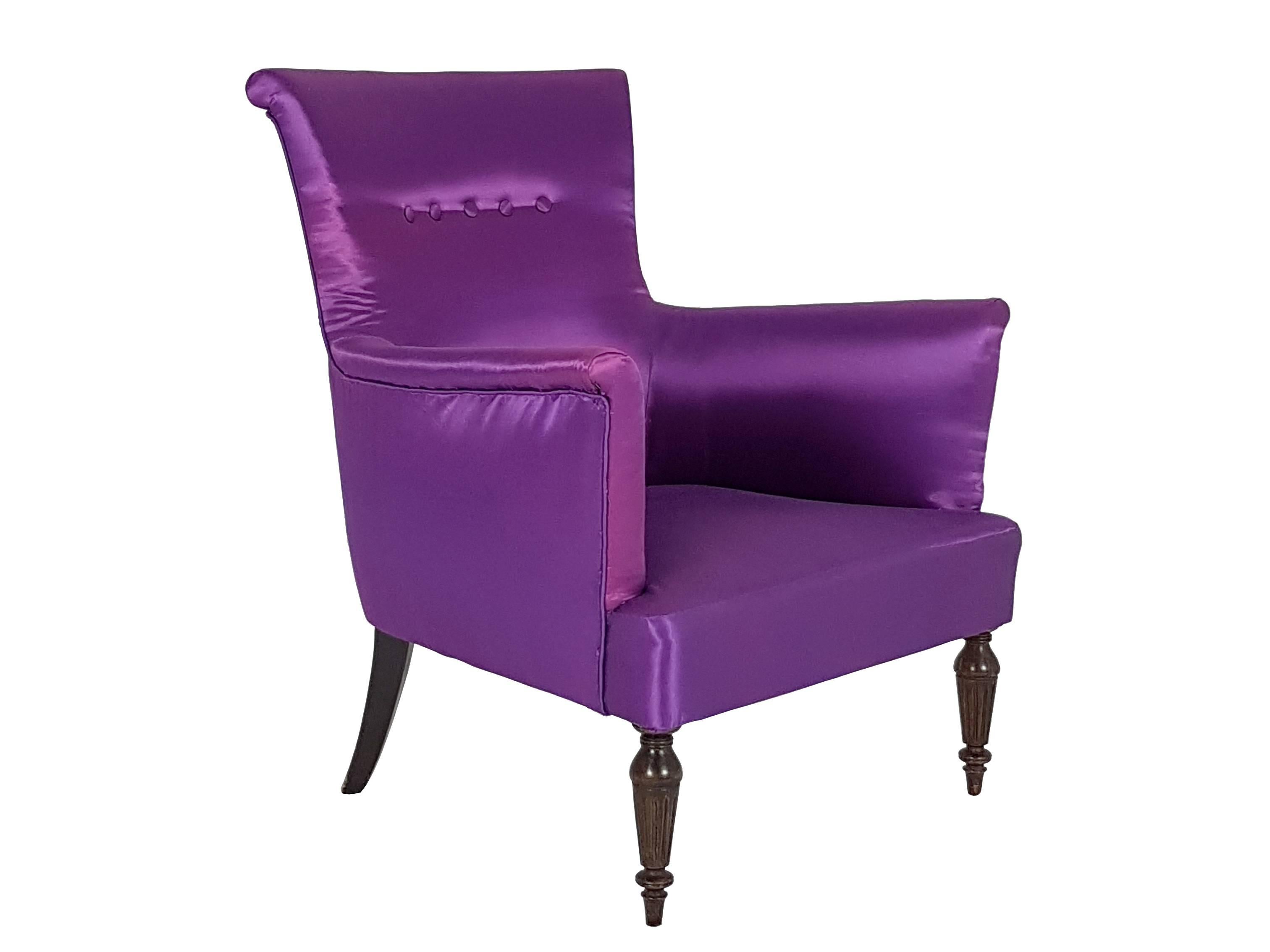 Fine and elegant pair of Italian armchairs with soft armrests and classic-style legs. The armchairs remain in a perfect condition: the old fabric upholstery has been replaced with a changing violet one.