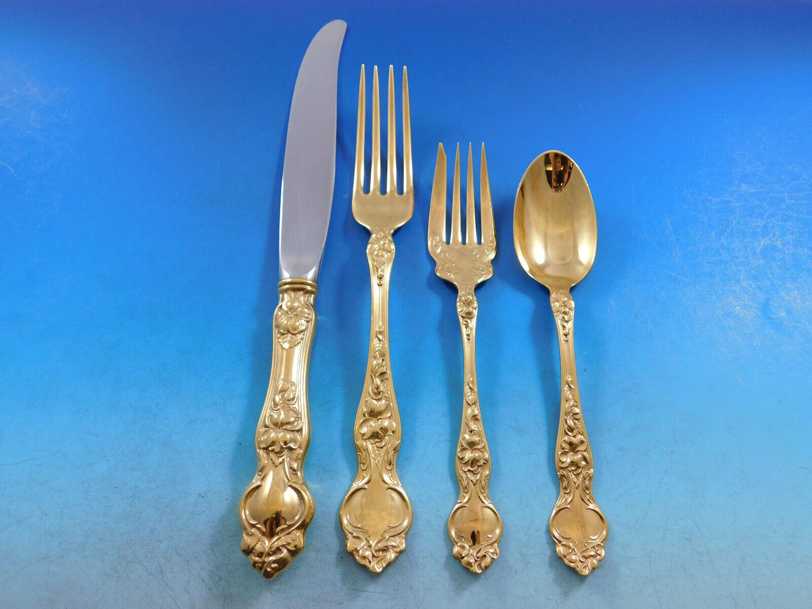Superb Dinner Size Violet Gold by Wallace Sterling Silver Flatware set - 61 pieces. This set is vermeil, completely gold-washed over sterling silver. This set includes:

12 Dinner Size Knives with Modern stainless blades, 9 7/8
