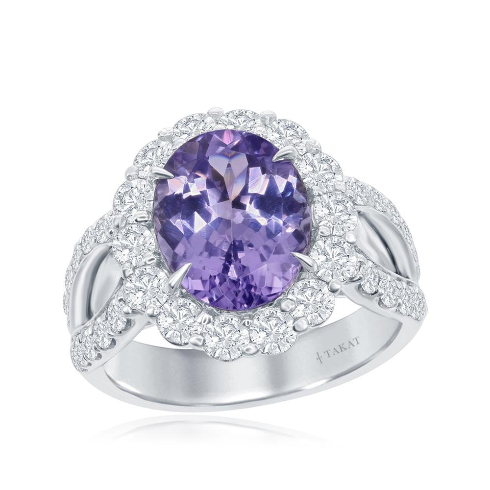 STRIKING TANZANITE RING IN PURPLE COLOR
This tremendous purple color Tanzanite benefits from the simple styling of round diamond band.
 
Item:	# 03013
Setting:	18K W
Lab:	GIA
Color Weight:	4.37 ct. of Tanzanite
Diamond Weight:	1.7 ct. of Diamonds
