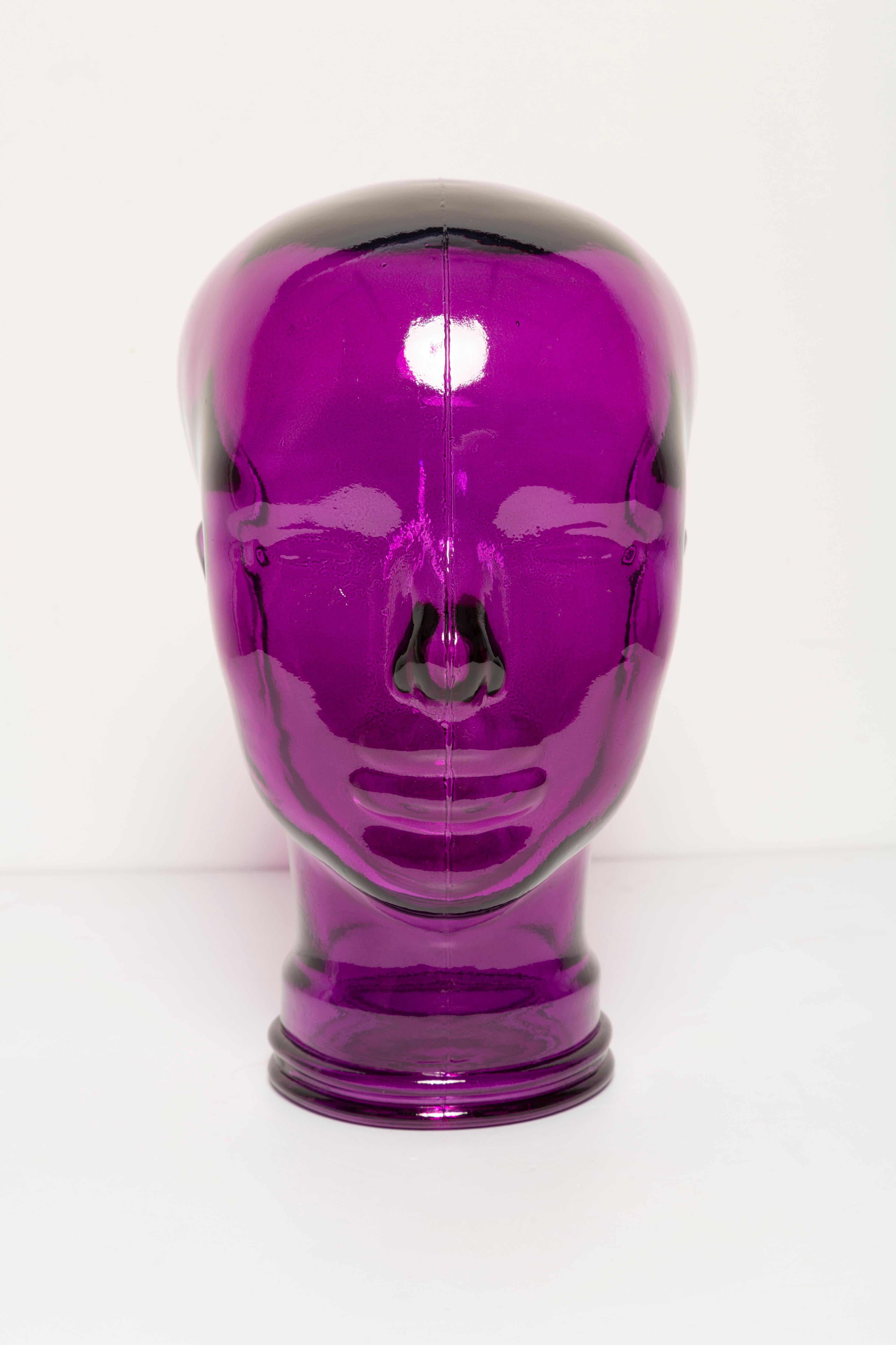Life-size glass head in a unique purple violet color. Produced in a German steelworks in the 1970s. Perfect condition. A perfect addition to the interior, photo prop, display or headphone stand.