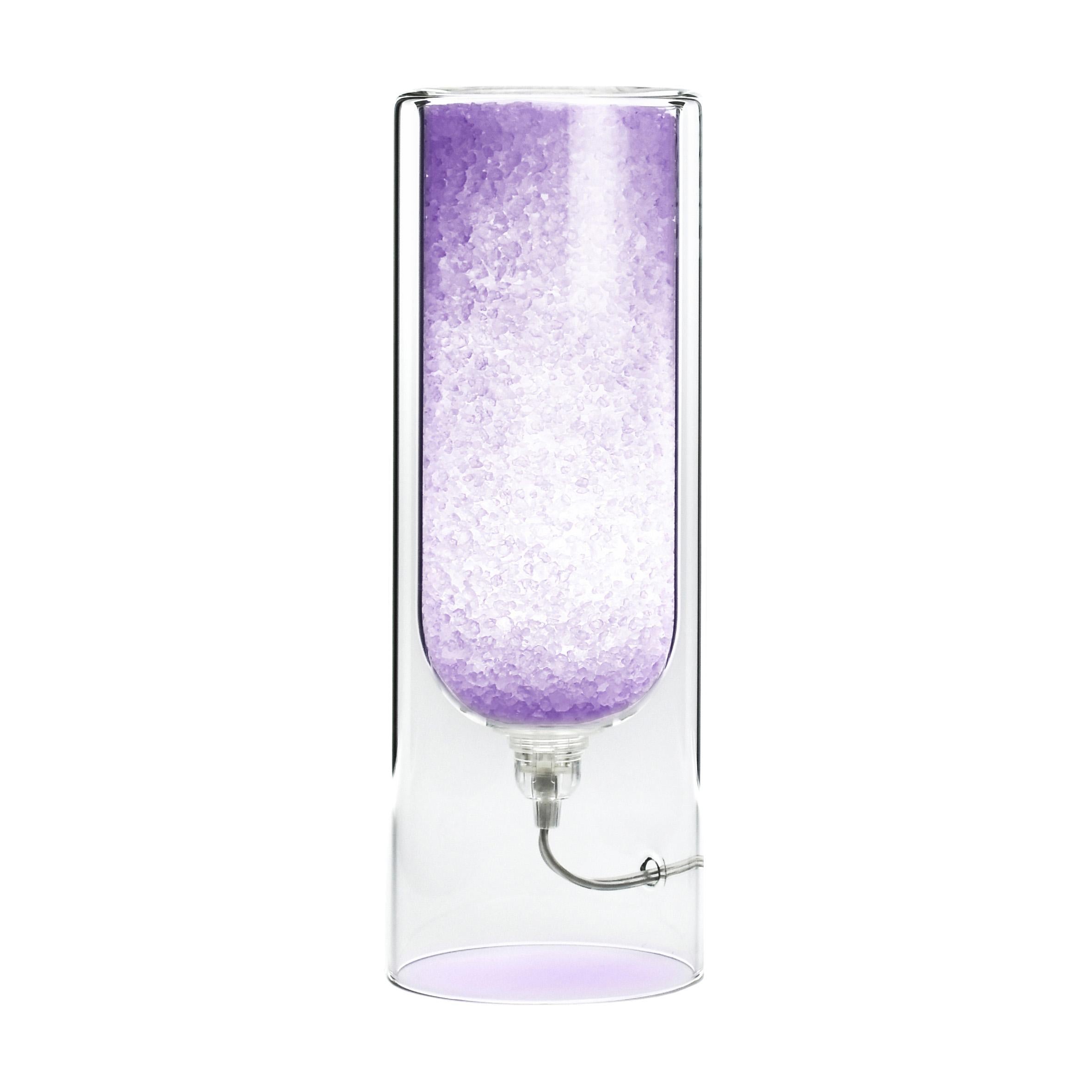 Violet Rocklumìna XXS table lamp by Coki Barbieri.
Dimensions: W 12 x D 12 x H 33.5 cm.
Materials: Italian rock salt crystals colored with natural pigments, mineral pigments from Italian soil and borosilicate glass.

All our lamps can be wired