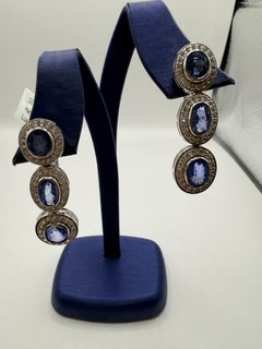 Violet Sapphire earrings with diamonds 18KT gold