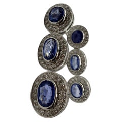 Violet Sapphire earrings with diamonds 18KT gold