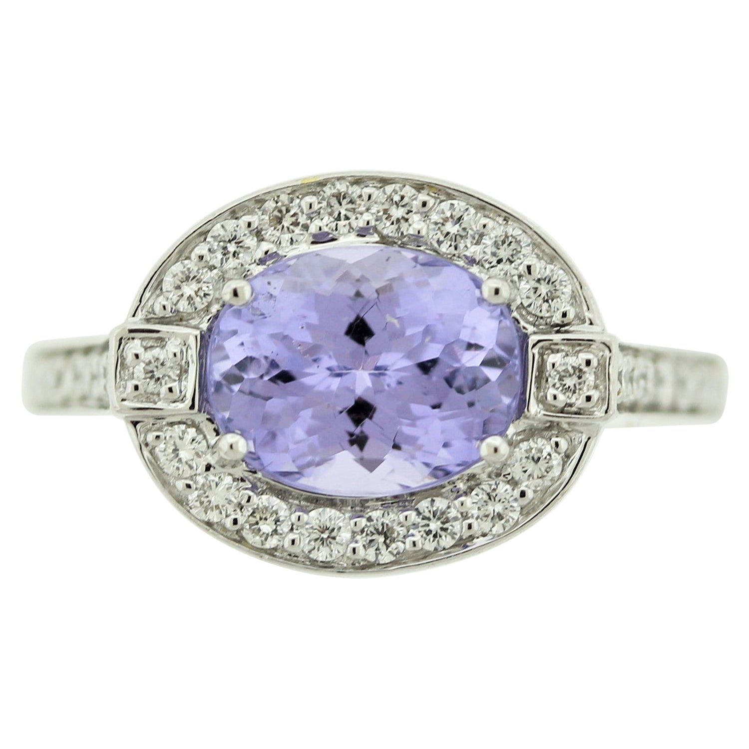 Bague en or avec diamant et spinelle violet