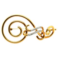 Violin Clef brooch by Meister with Diamonds in 18 Karat Yellow Gold
