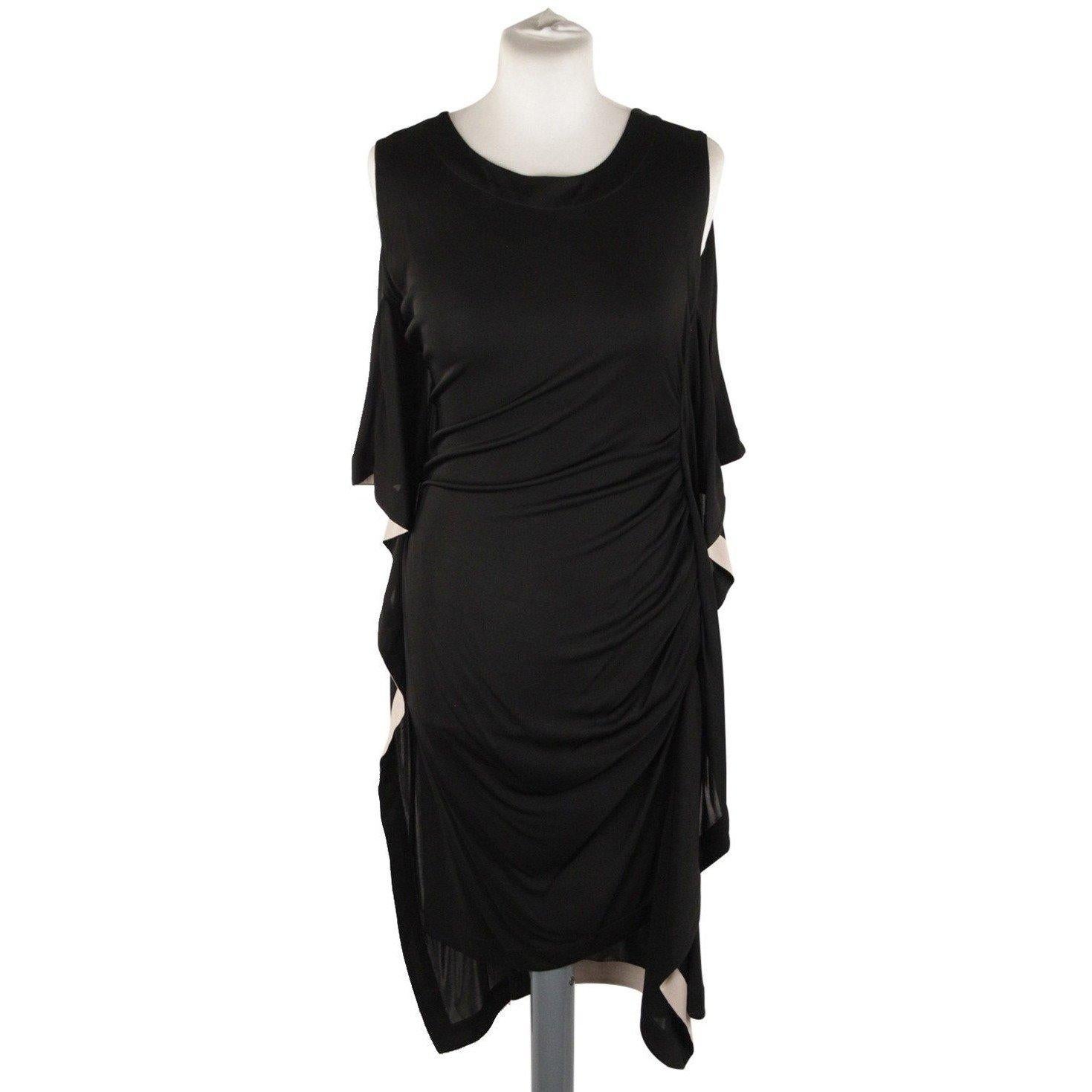Vionnet Black Silky Sleeveless Dress Knee Lenght with Frills . Black silky sleeveless dress . Round neck. Sleeveless design. Frilled side. Draped detailing on the side. Contrast trim. Size is not indicated. Estimated size is a SMALL size. Made in