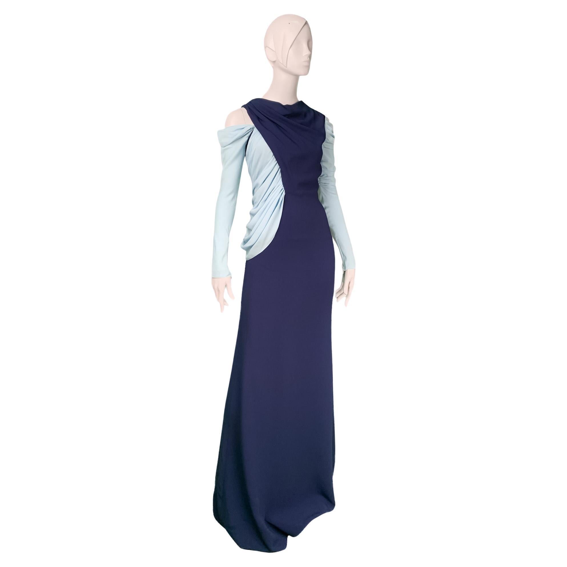 From Maison Vionnet Paris, a silk floor-length asymmetrical evening gown with color block design in navy-blue and pastel blue. Impressive with its dramatic draperies and expert tailoring, very reminiscent of the early days of Madeline Vionnet's