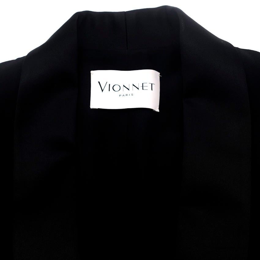 Vionnet Paris Black Double Layer Jacket 

- Black Long Sleeved Jacket
- Double layered front, single breasted
- Shiny Collar 
- Side decorative pockets
- 100% Viscose. Lining: 100% Silk
- 
Please note, these items are pre-owned and may show some