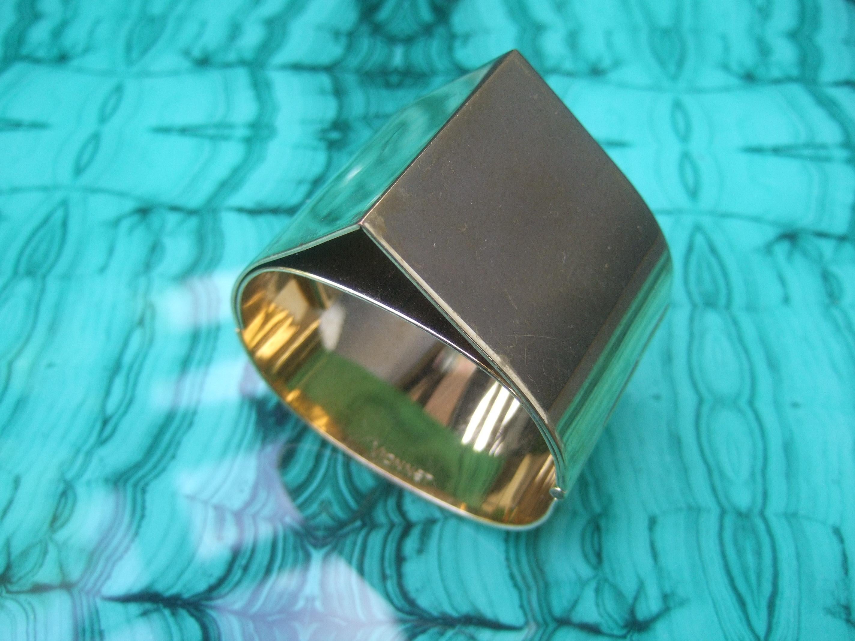 Vionnet Sleek Wide Gilt Metal Hinged Cuff Bracelet c 1990s In Good Condition For Sale In University City, MO