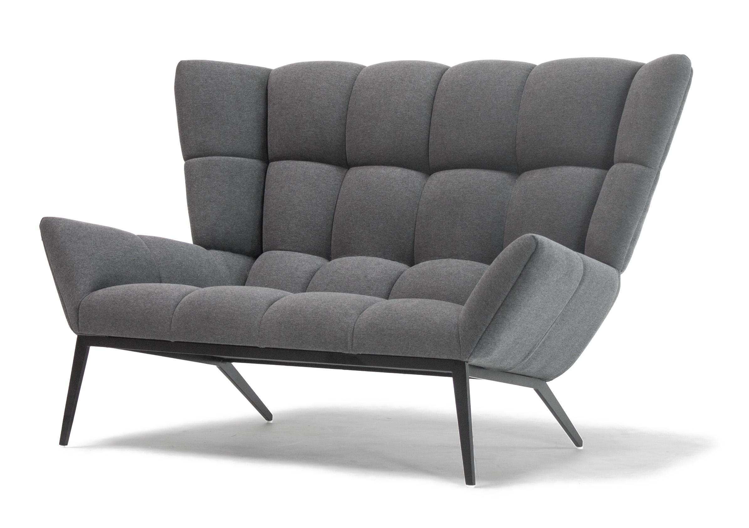 The Tuulla Loveseat, like the Tuulla Chair, takes the idea of tufting to a new level of comfort for two. The loveseat is “made” of tufts over an elegant and sophisticated form. With the lean of the piece and the tufted lumbar support, you’ll love