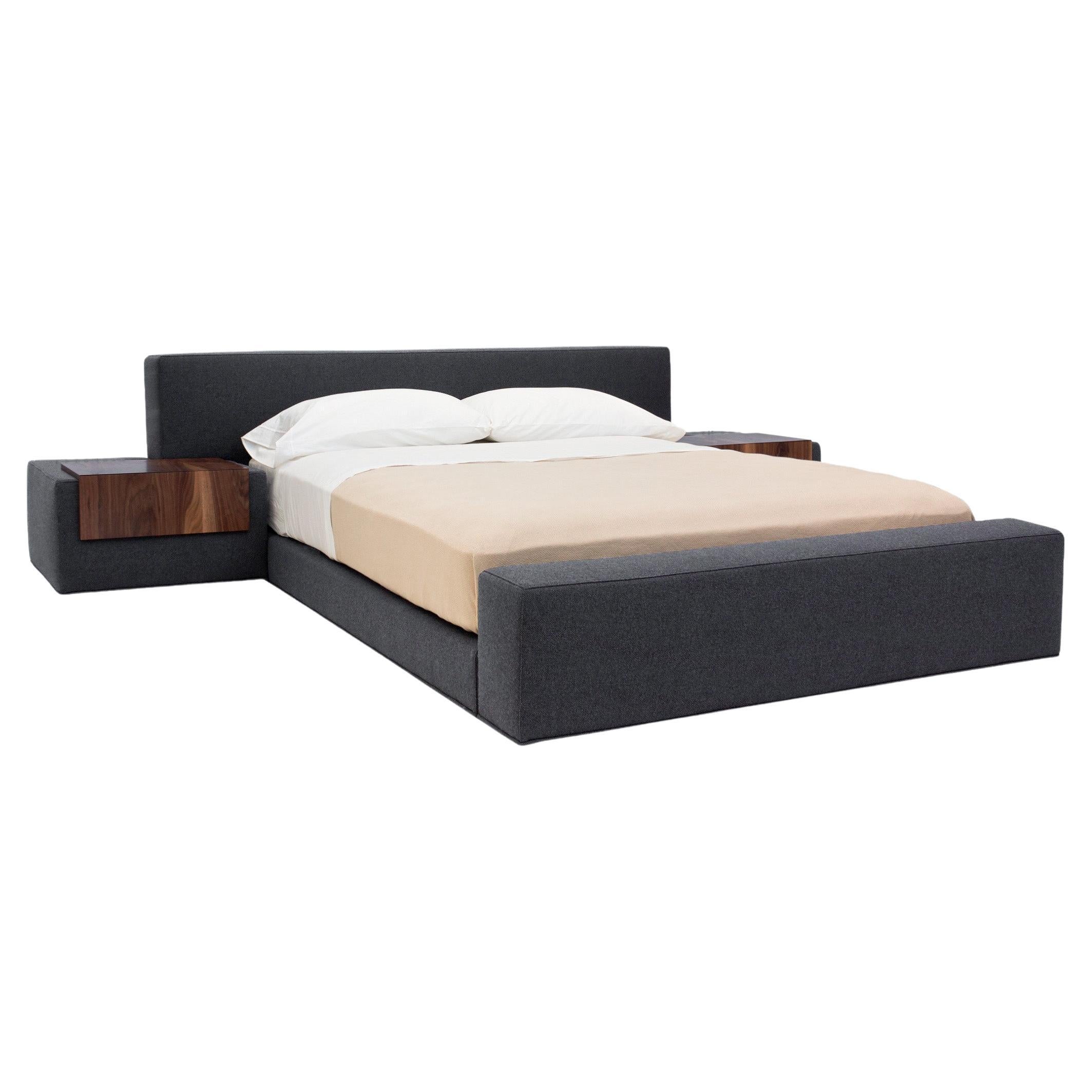 Good design doesn’t have to sacrifice functionality. The Zurich Bed is a unique bed where the nightstands are part of the bed itself.  The upholstered drawer units each have a “camouflaged” drawer, looking like a solid piece of wood. The extra wide