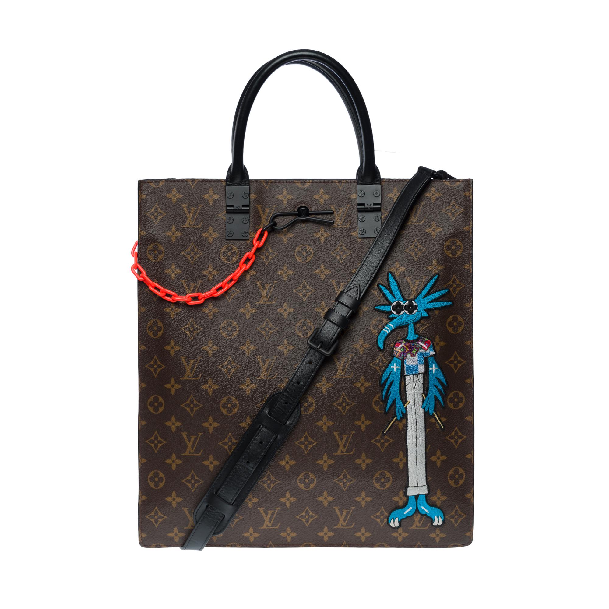 The classic Louis Vuitton monogram is elevated in this amazing and rare piece with Virgil Abloh's signature colourful chain and cartoon character patch from his animated film for the Louis Vuitton Men's Spring-Summer 2021 show. Featuring a matte