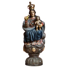 Vierge à l
enfant en bois polychrome sur un nuage avec des chérubins, Espagne/Colonie