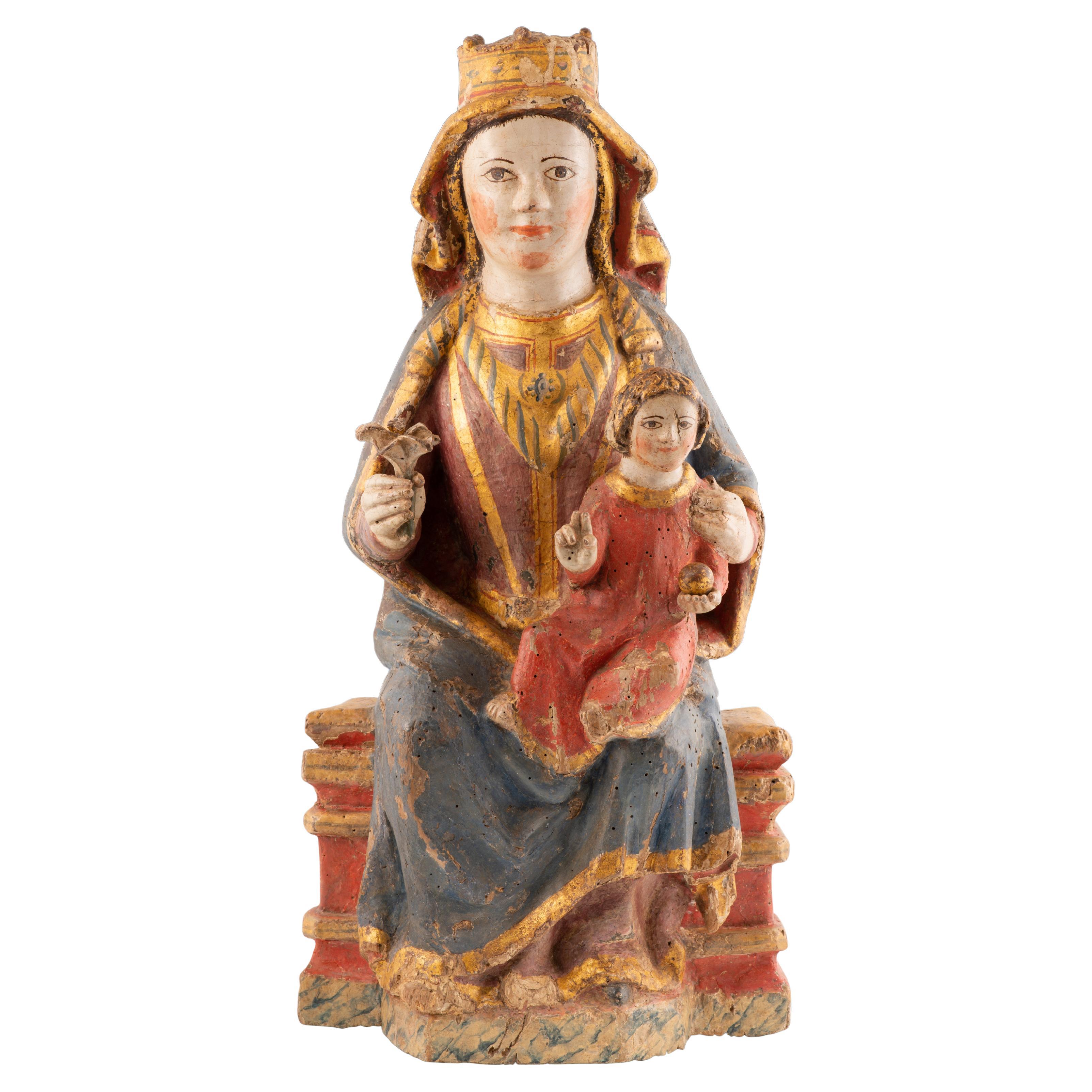 Virgin and Child Jesus. Carved and polychrome wood. Spanish School, 14th century For Sale