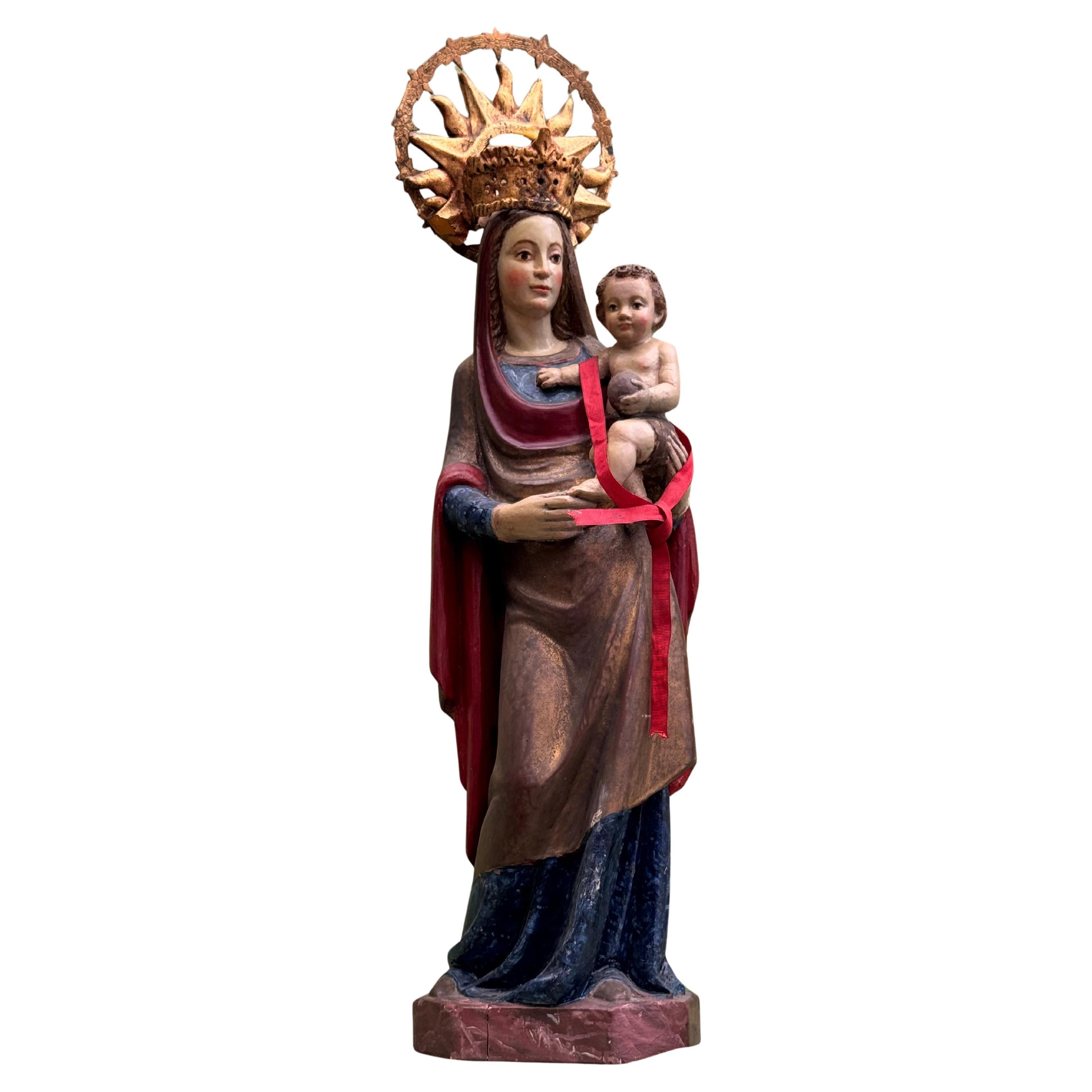 Virgin and Child, polychrome wood carving, Hispanic school, 16th-17th century