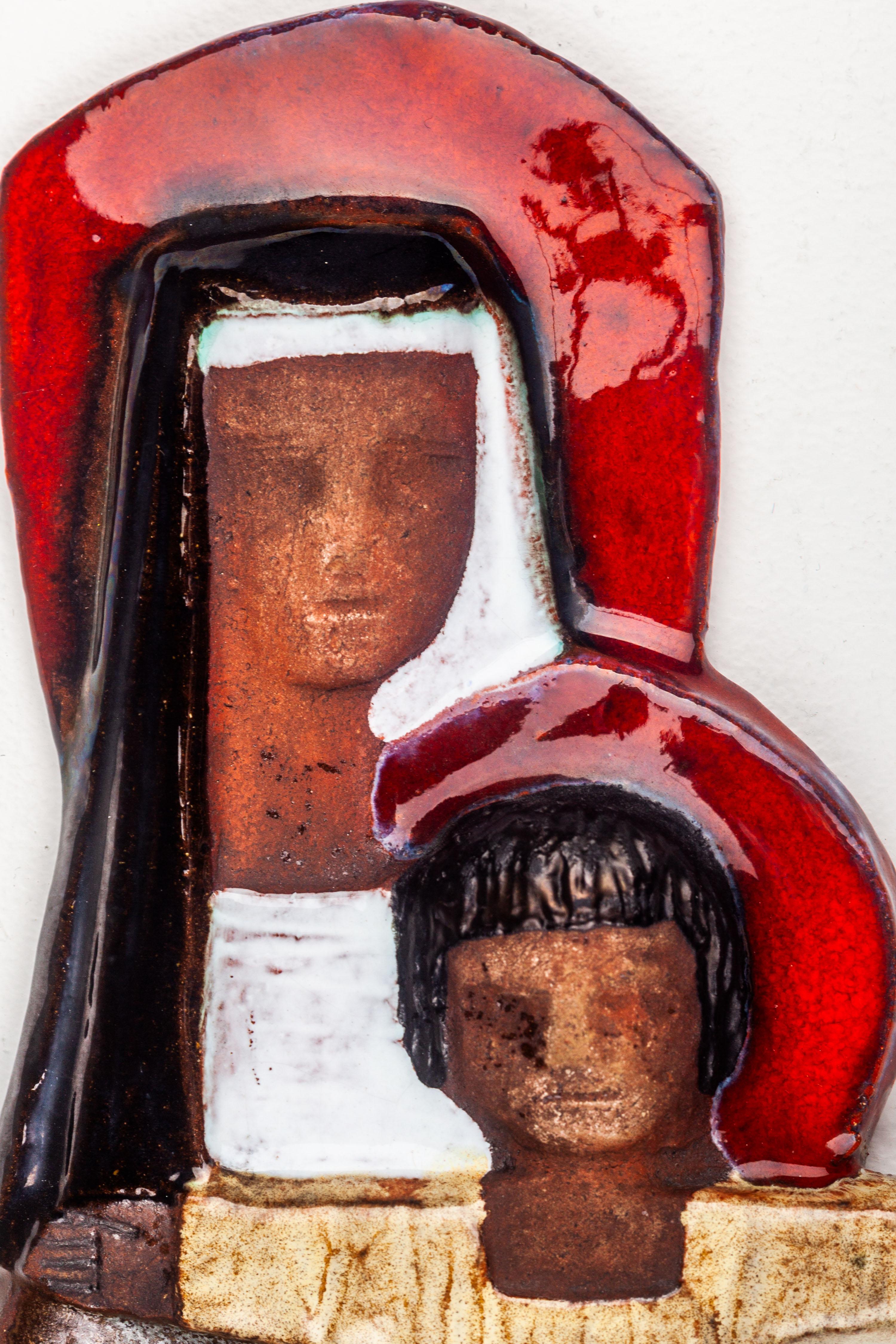 Modernist Virgin Mary and Child Jesus. Large 19-Inches Studio Pottery wall decoration. Interesting display of matte and glazed areas. Masterful color textures compositions on audacious modernist volumes. Tradition and modernity.

Our European cross