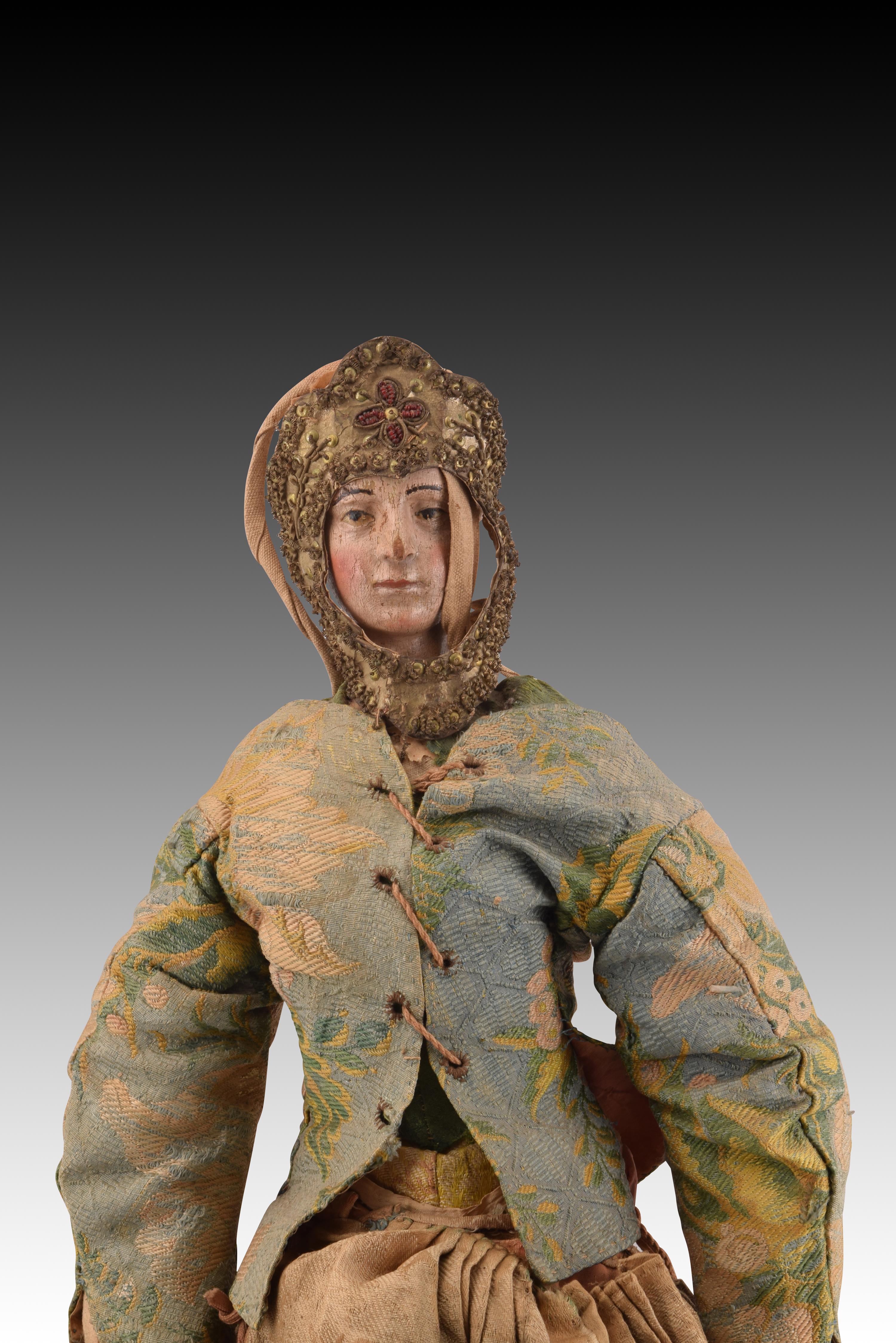 Virgin of Dress. Carved and polychrome wood, etc. Spanish school, 17th century; later clothing. 
Has damage. 
Polychrome wood carving of the type of dress or dress that has a series of garments: skirt, blouse, rostrillo, etc. Religious sculptures