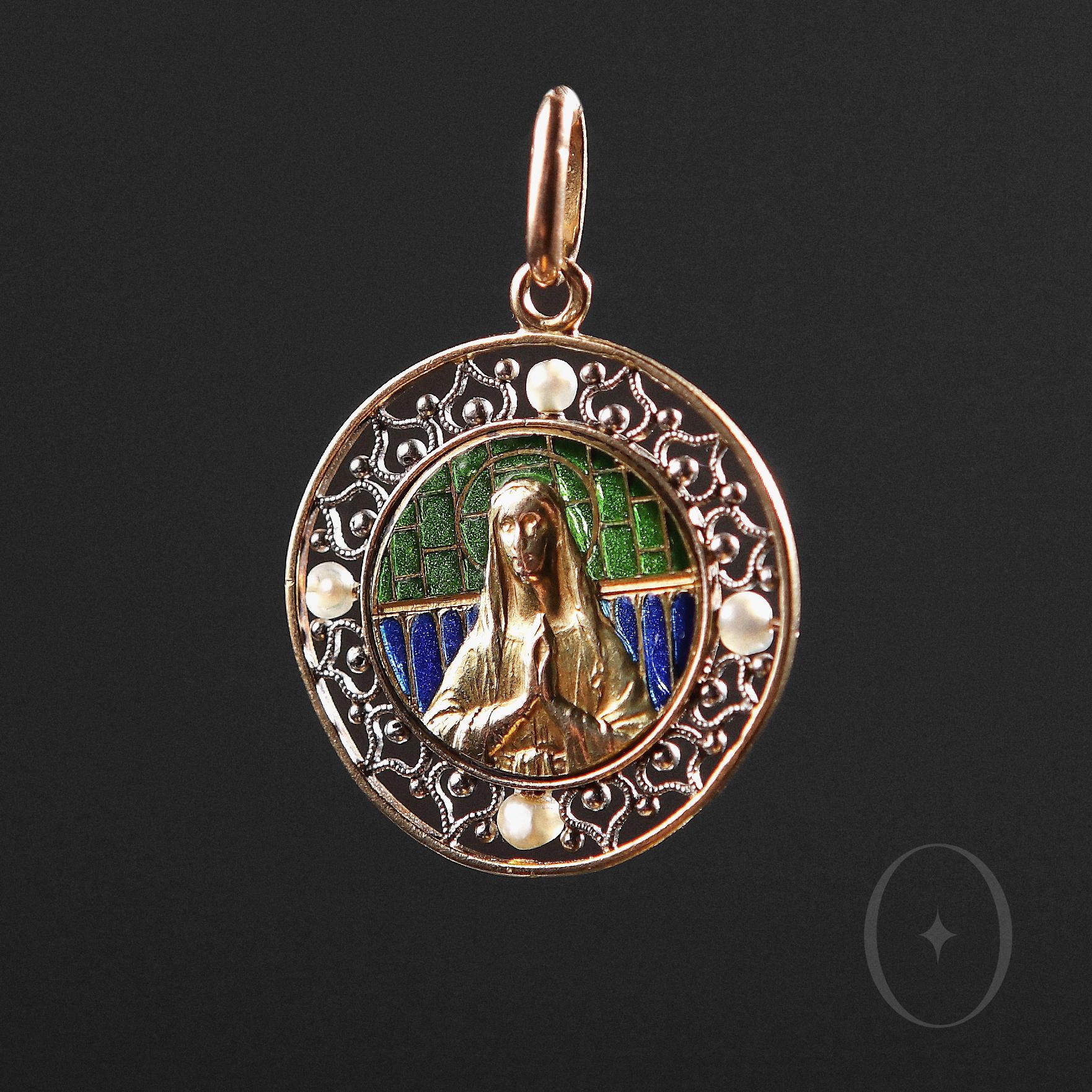 Virgin Mary Enamel 18 ct Yellow Gold French Pendant created in the Plique A Jour technique. 
Necklace belongs to Art Nouveau period (1885/1914 years) decorated with the green and blue color enamel and four white pearls.
Its very special Virgin Mary