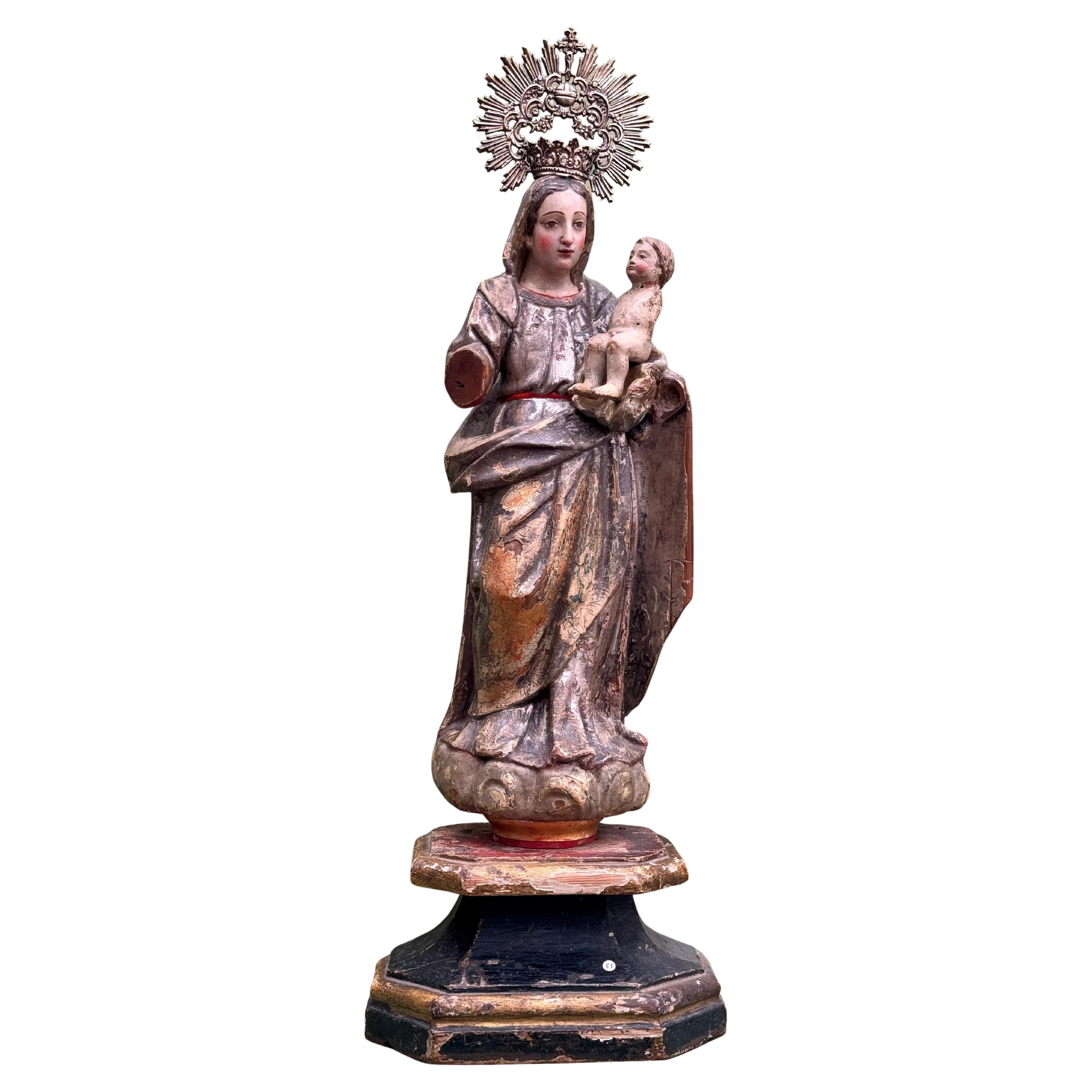 Virgin of La Antigua with Child, polychrome wood carving with silver crown, 16th