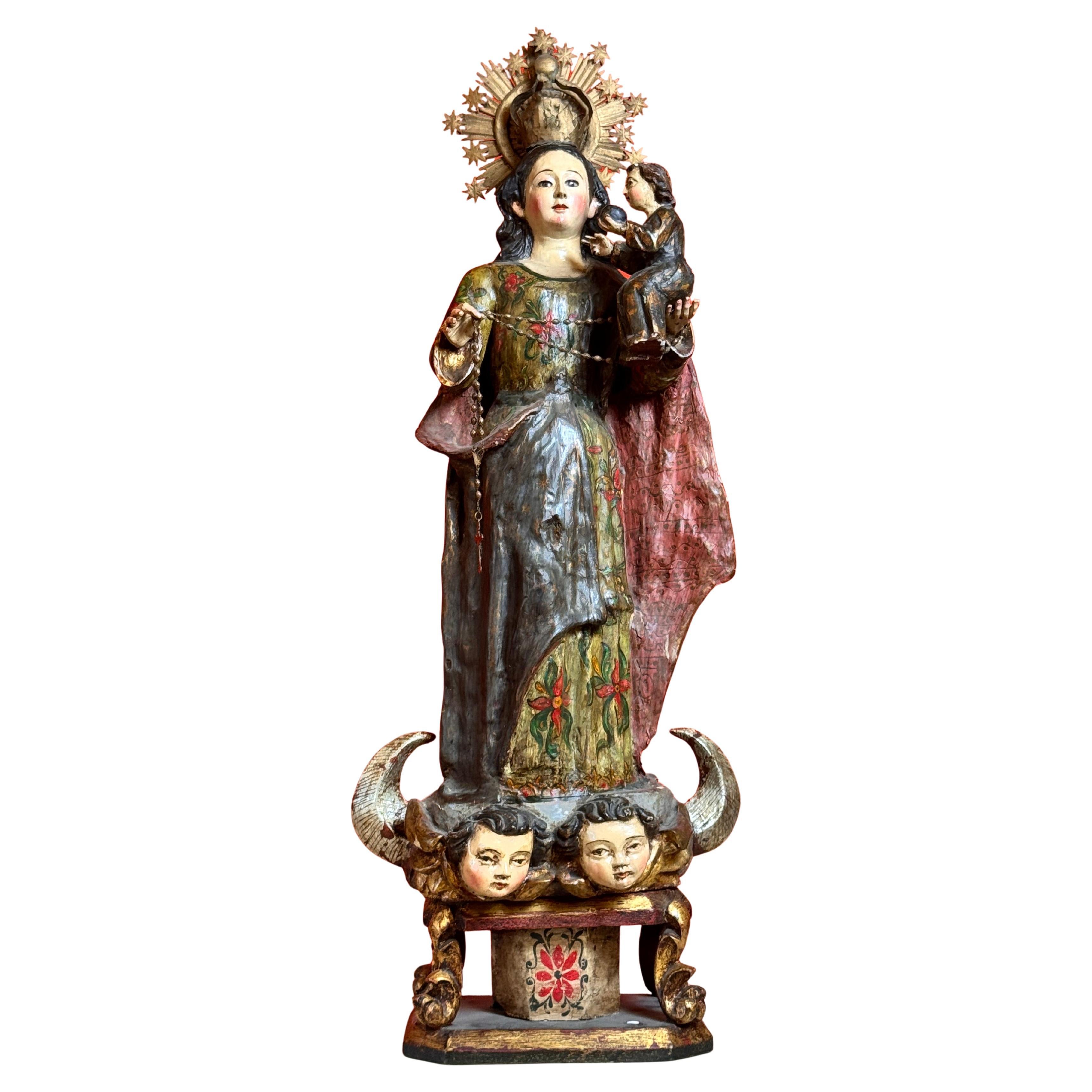 Vergine di Miraflores in legno di maguey policromo con Bambino e corona di rame, XVIII