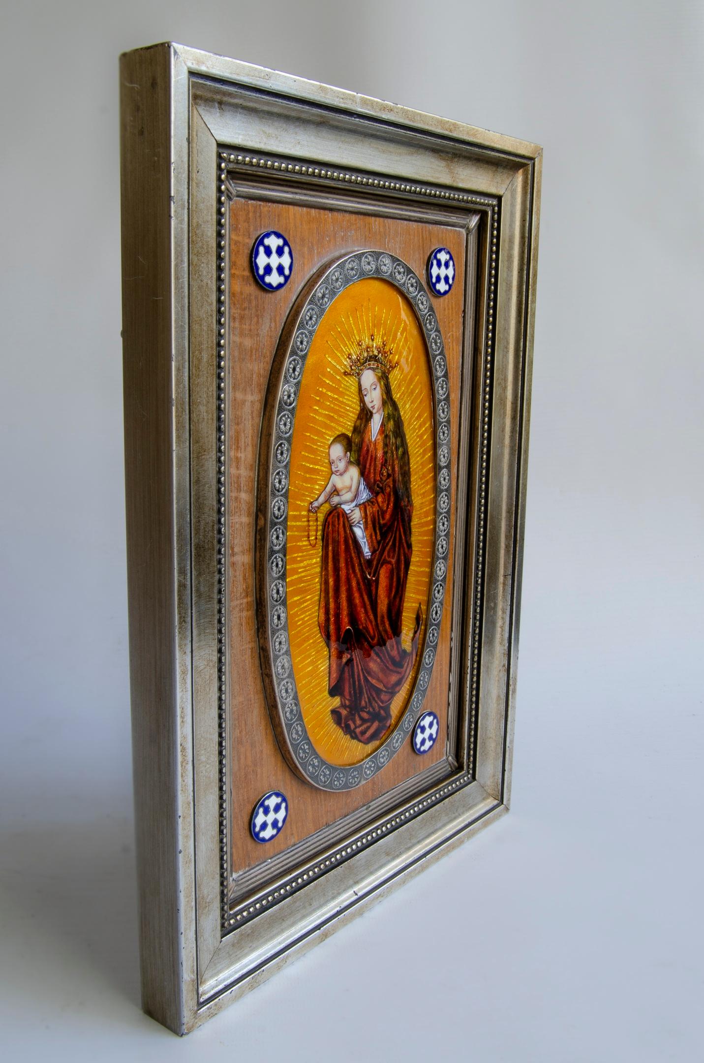 Virgin of silver and enamel (Masriera y Carrera)
the image of the virgin and her corners are made of silver
the frame is silver wood
made by Spanish artists Masriera y Carrera
Origin Spain 20th century
circa 1960.