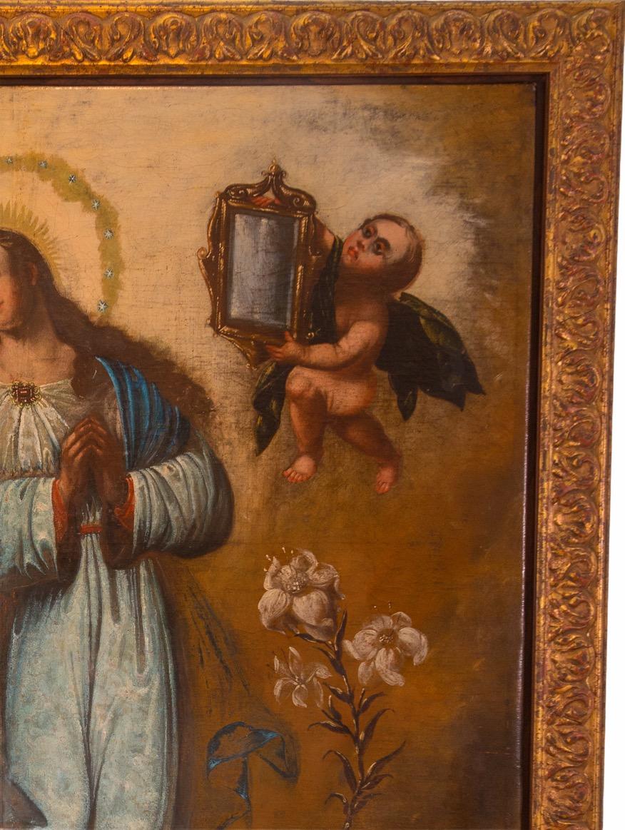16th Century Spanish Colonial Oil on canvas painting of the Virgin of the Immaculate Conception. In this representation of the Virgin Mary being free of original sin from the moment of her conception, the virgin is stepping on a serpent eating an