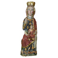 Virgin with Child. Carved and polychrome wood. Spanish school, 13th century.
