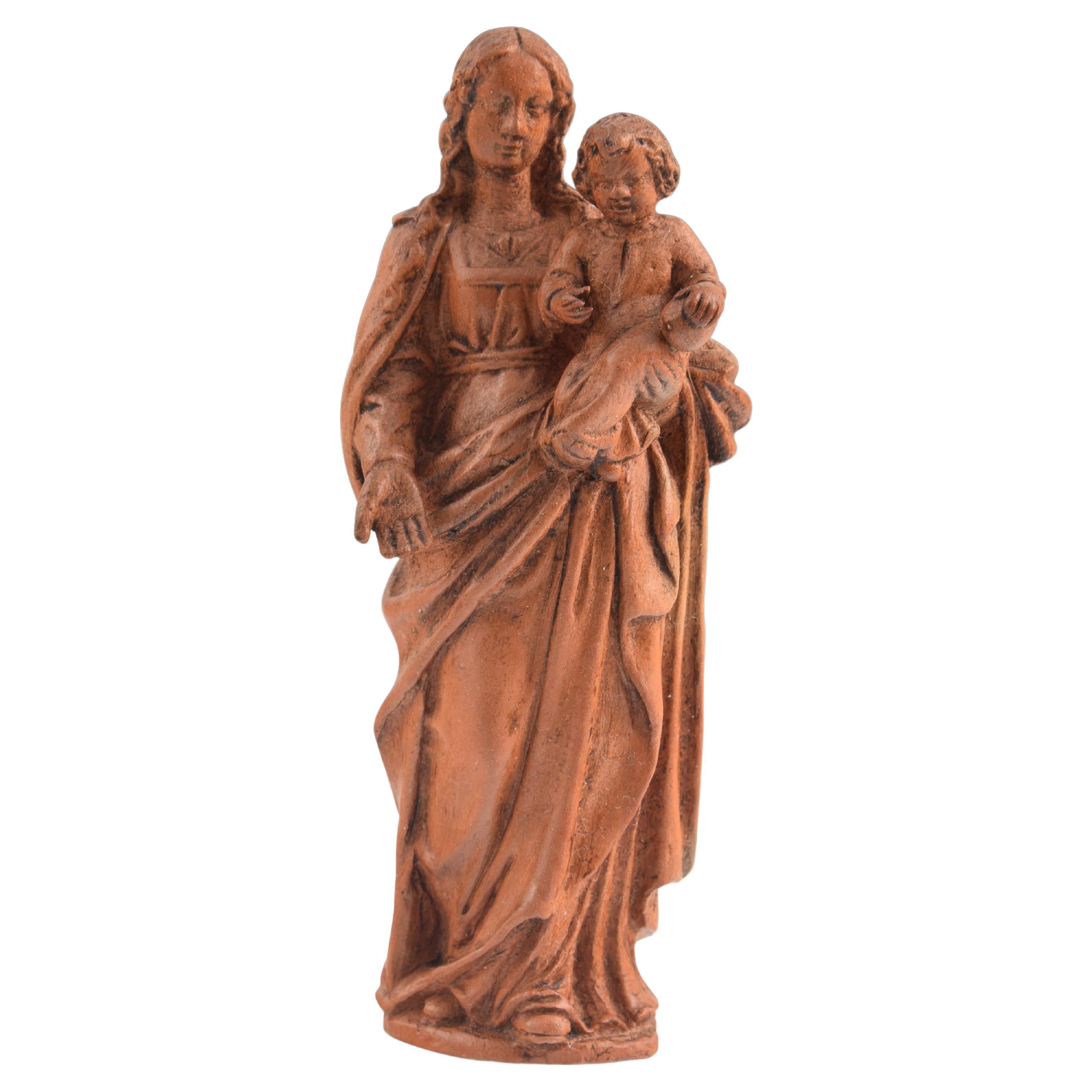 Vierge à l'enfant. Terracotta. 20e siècle, d'après des modèles du 17e siècle en vente