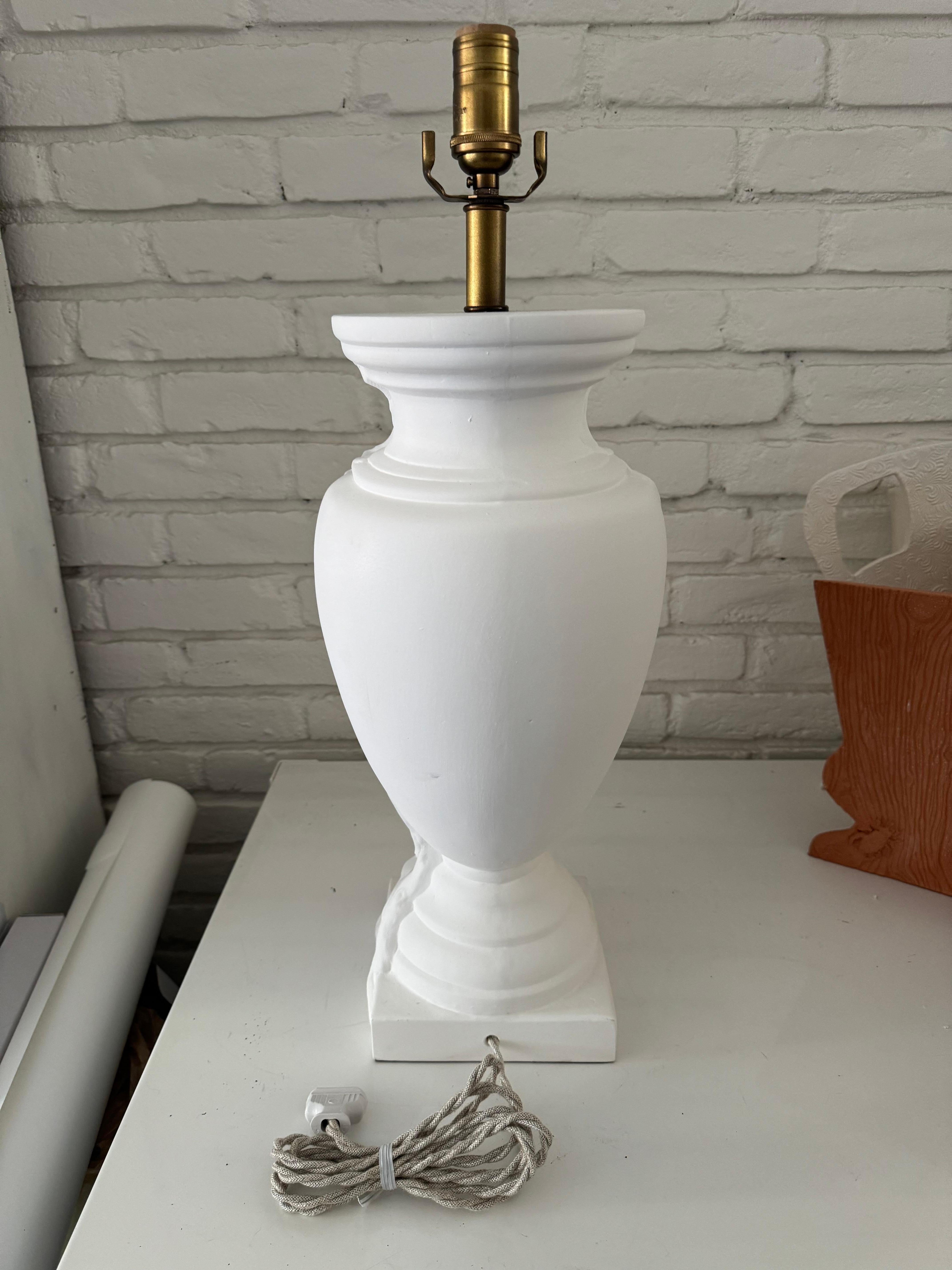 My favorite classic urn shaped lamp, inspired by my house in France covered with Virginia Creeper vines. A timeless garden inspired matte white lamp with antique brass colored solid brass dimmer socket and luxe twisted linen cord. 