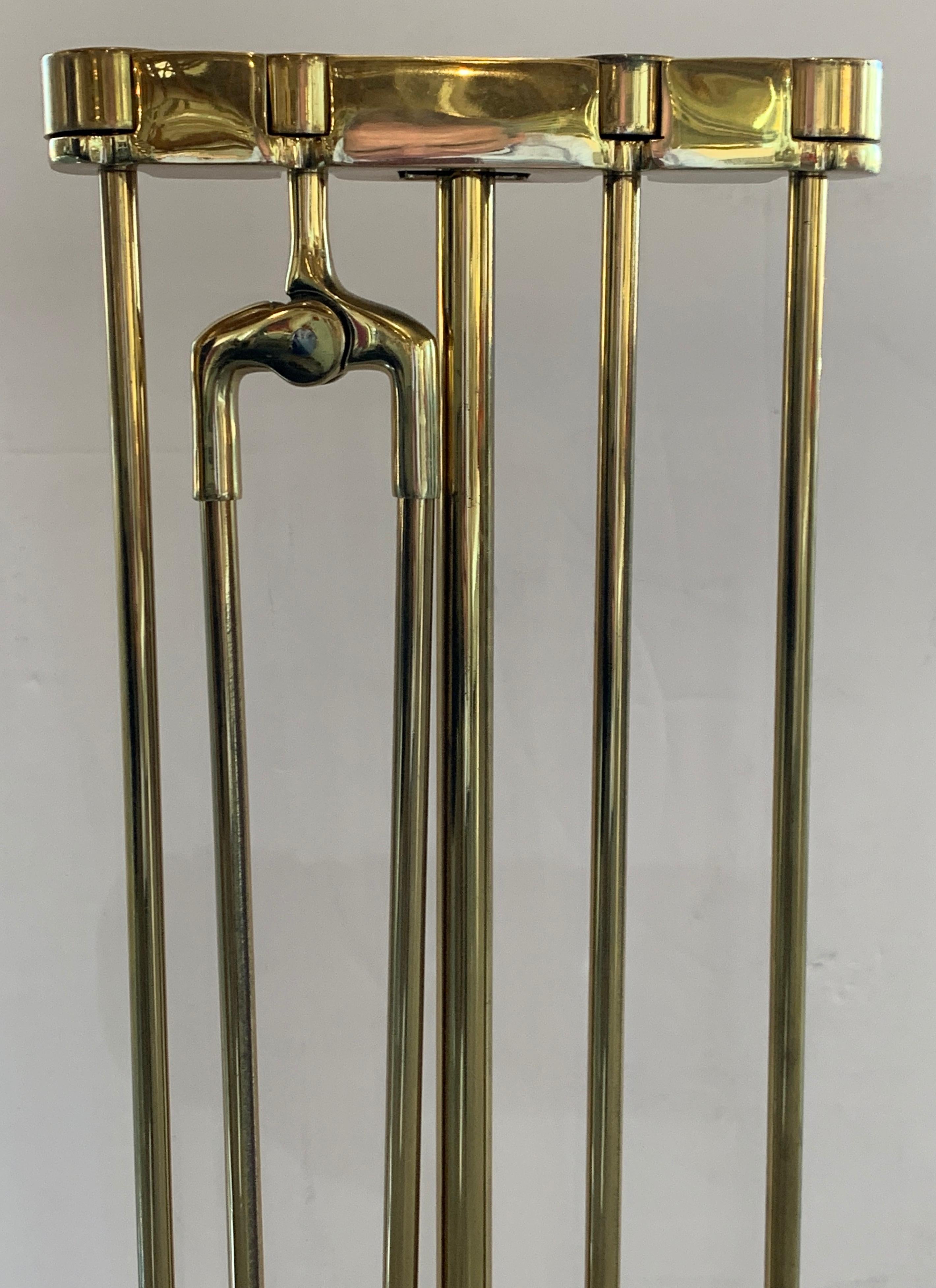 A nice vintage brass set of fire tools by Virginia Metalcrafters from the 1970s. In good age appropriate condition, with some marks and imperfections. It has been polished, but will tarnish with time.