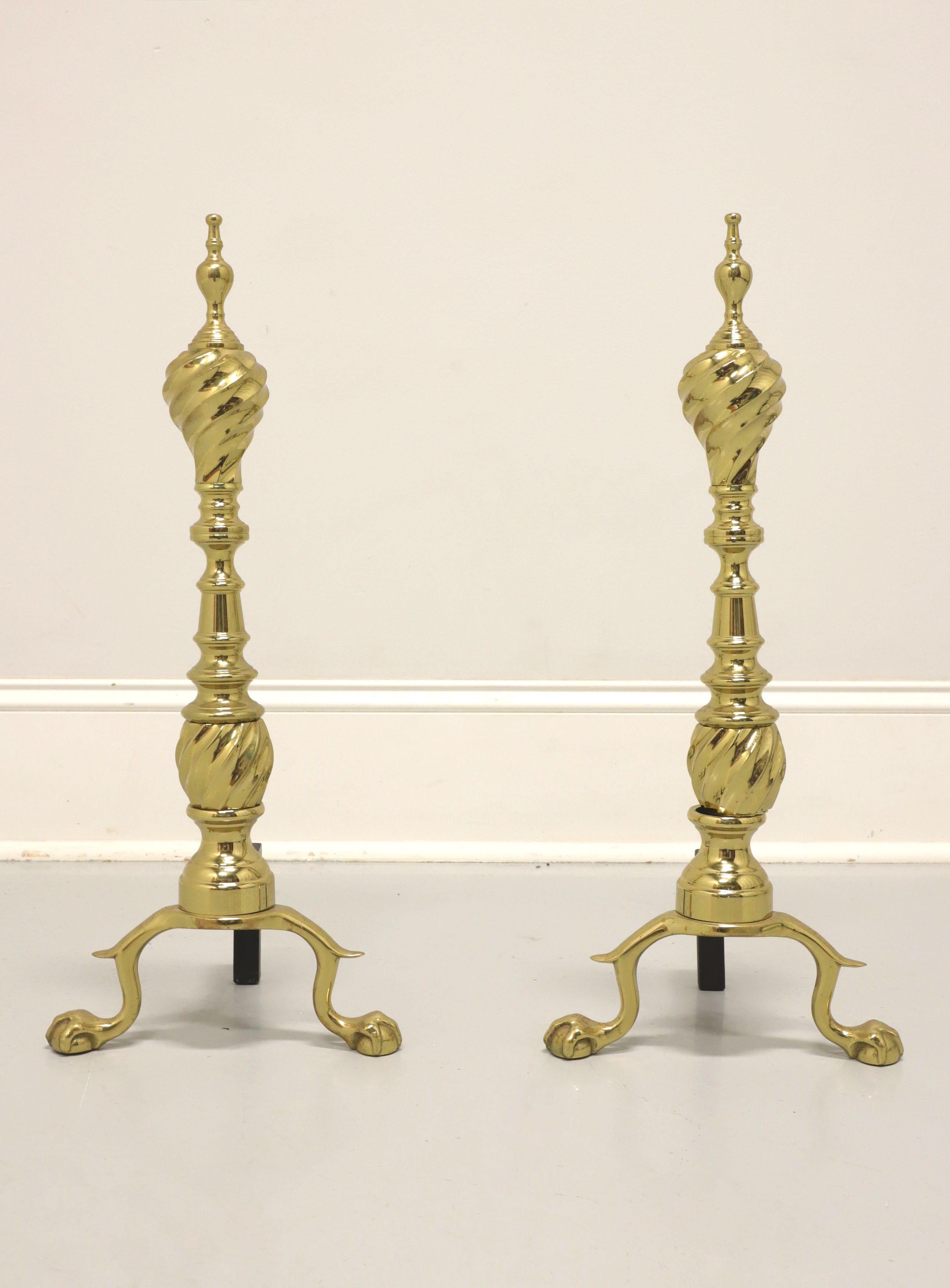 A pair of Traditional style fireplace andirons by Virginia Metalcrafters. A historic reproduction of andirons found in Middleton House in Charleston, South Carolina, USA and approved by the Historic Charleston Foundation. Solid polished brass