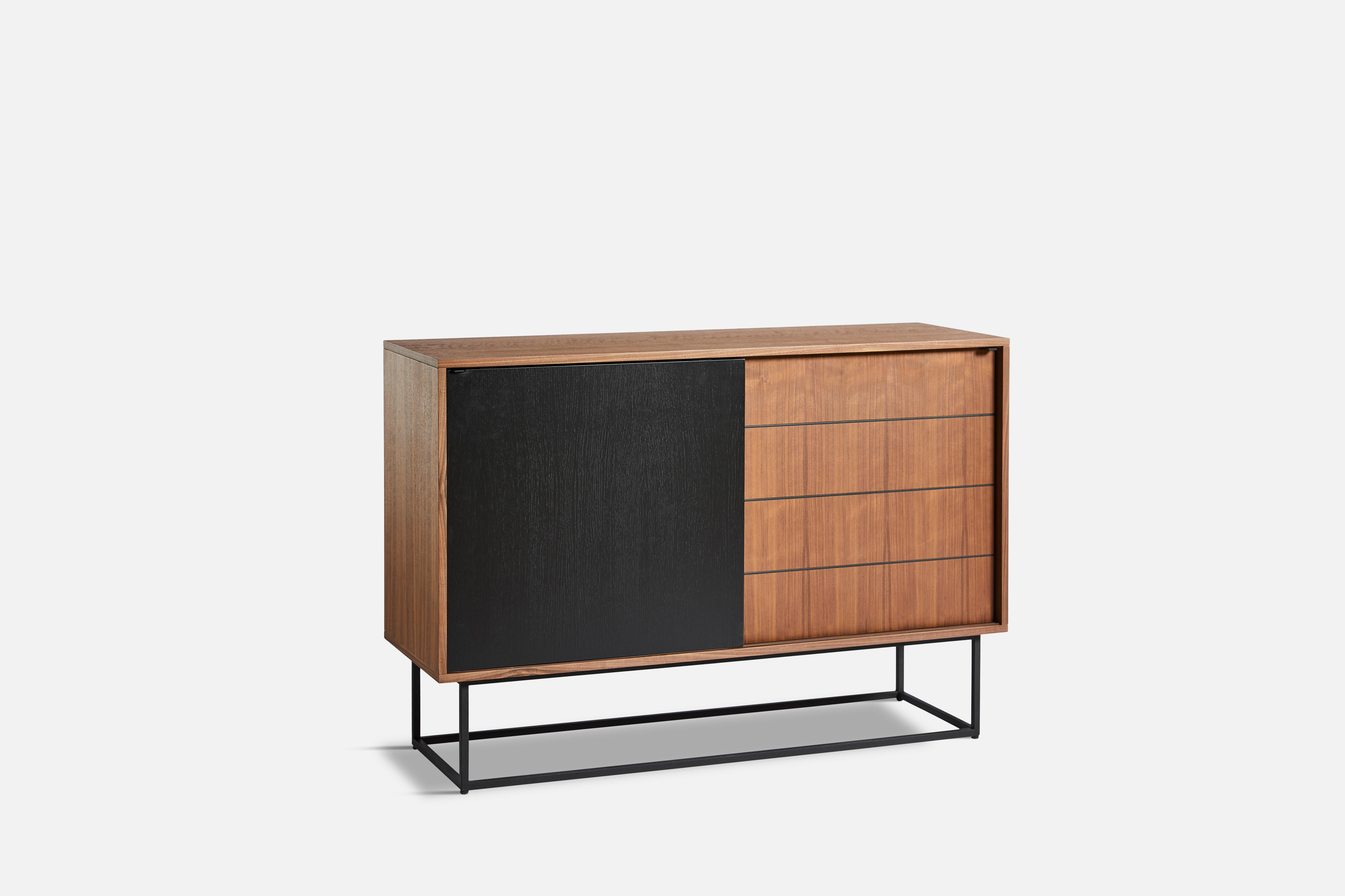 Virka high sideboard by Ropke Design and Moaak
Materials: walnut, metal.
Dimensions: D 40 x W 120 x H 82 cm
Also available in different colours and materials.

The founders, Mia and Torben Koed, decided to put their 30 years of experience into