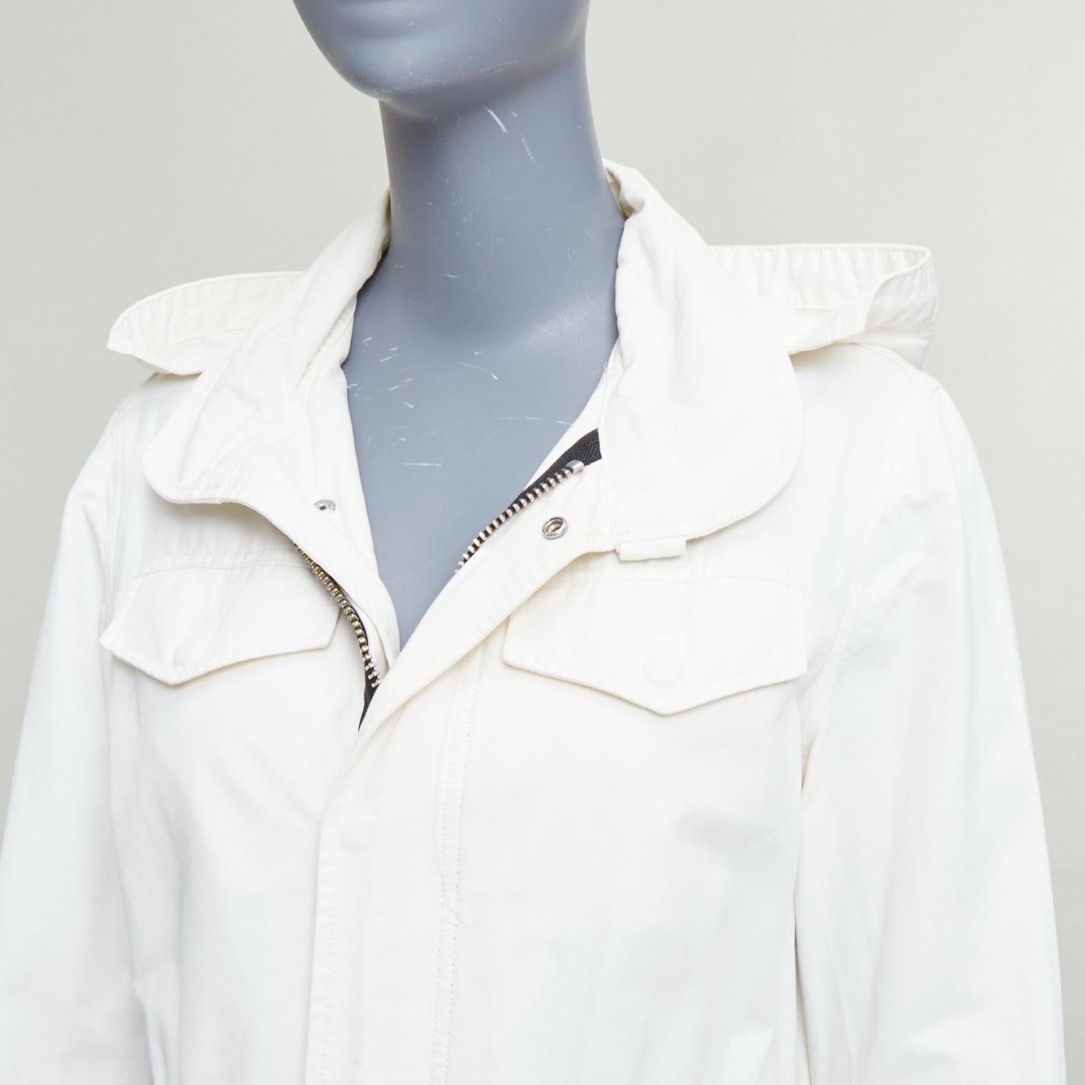 VIS A VIS 2017 white cotton linen black drawstring anorak coat Sz2
Reference: JACG/A00263
Brand: Vis a Vis
Collection: SS 2017
Material: Cotton, Linen
Color: White, Black
Pattern: Solid
Closure: Zip
Made in: Korea

CONDITION:
Condition: Fair, this
