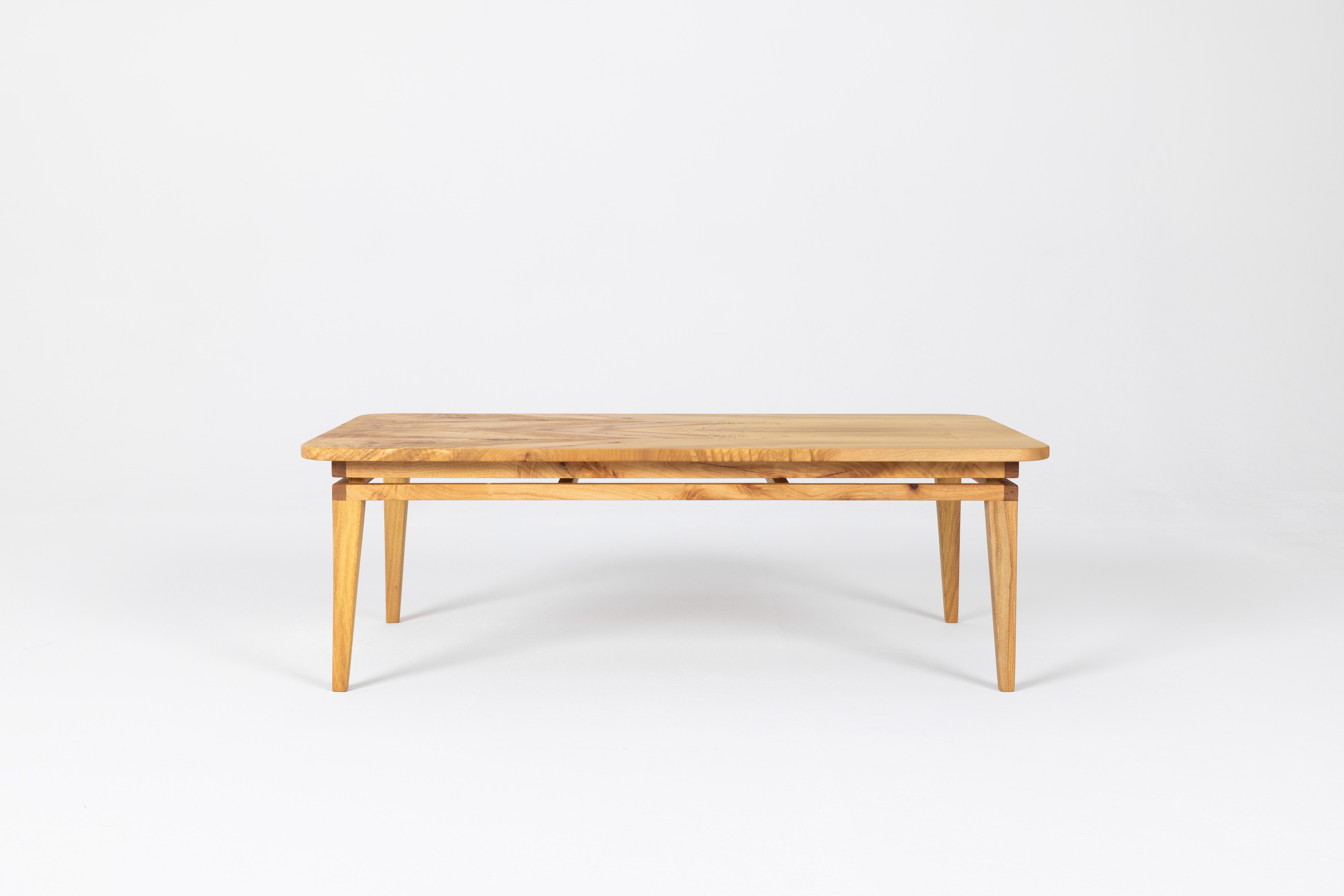 Visaeti Coffee Table. Visaeti, in old church Slovanic, means to hoover, to soar, to linger in the air. This highly constructed coffee table gives an airy floating feel while being firmly planted on the ground. Shown in camphor at 48