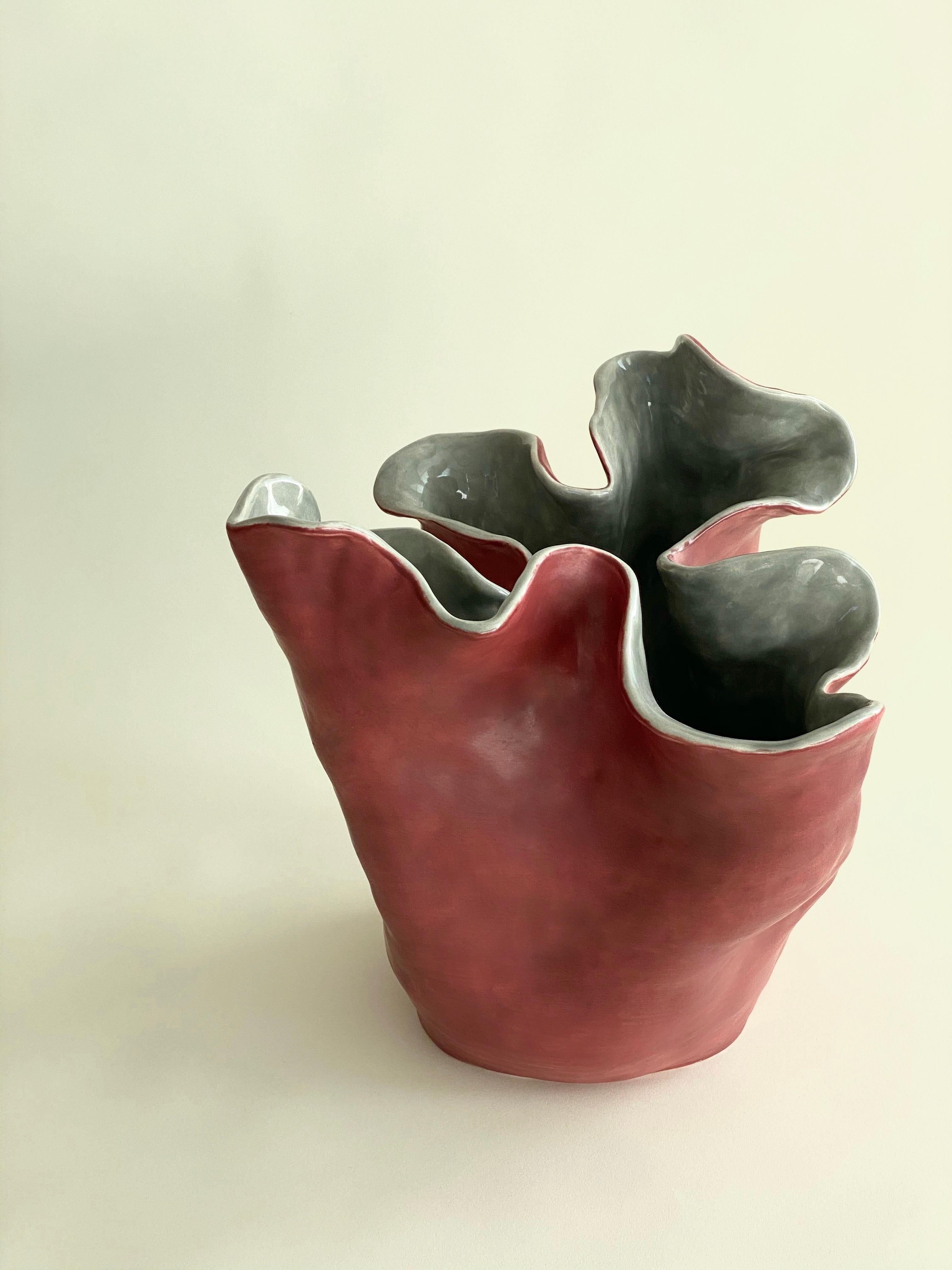Visceral I, Red and grey, 2020 by Magda von Hanau
From the series Visceral
Clay Sculpture with Glass Glaze
Dimensions: 30.4 H x 40.6 W cm

The Visceral series delves into the intricate relationship between the mind and the body, specifically