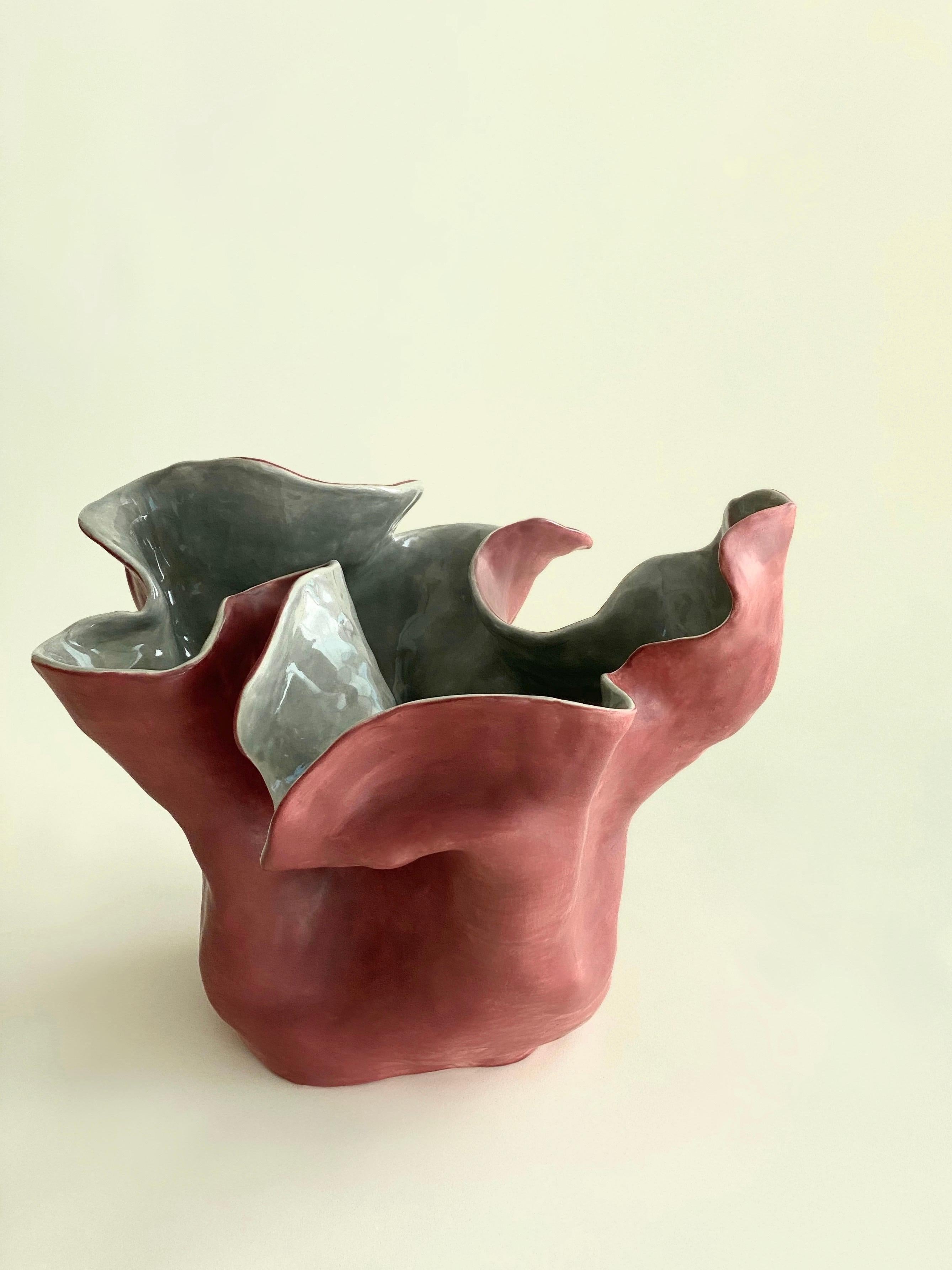 Visceral II, Red and grey, 2020 by Magda von Hanau
From the series Visceral
Clay Sculpture with Glass Glaze
Dimensions: 30.4 H x 40.6 W cm 

The Visceral series delves into the intricate relationship between the mind and the body, specifically