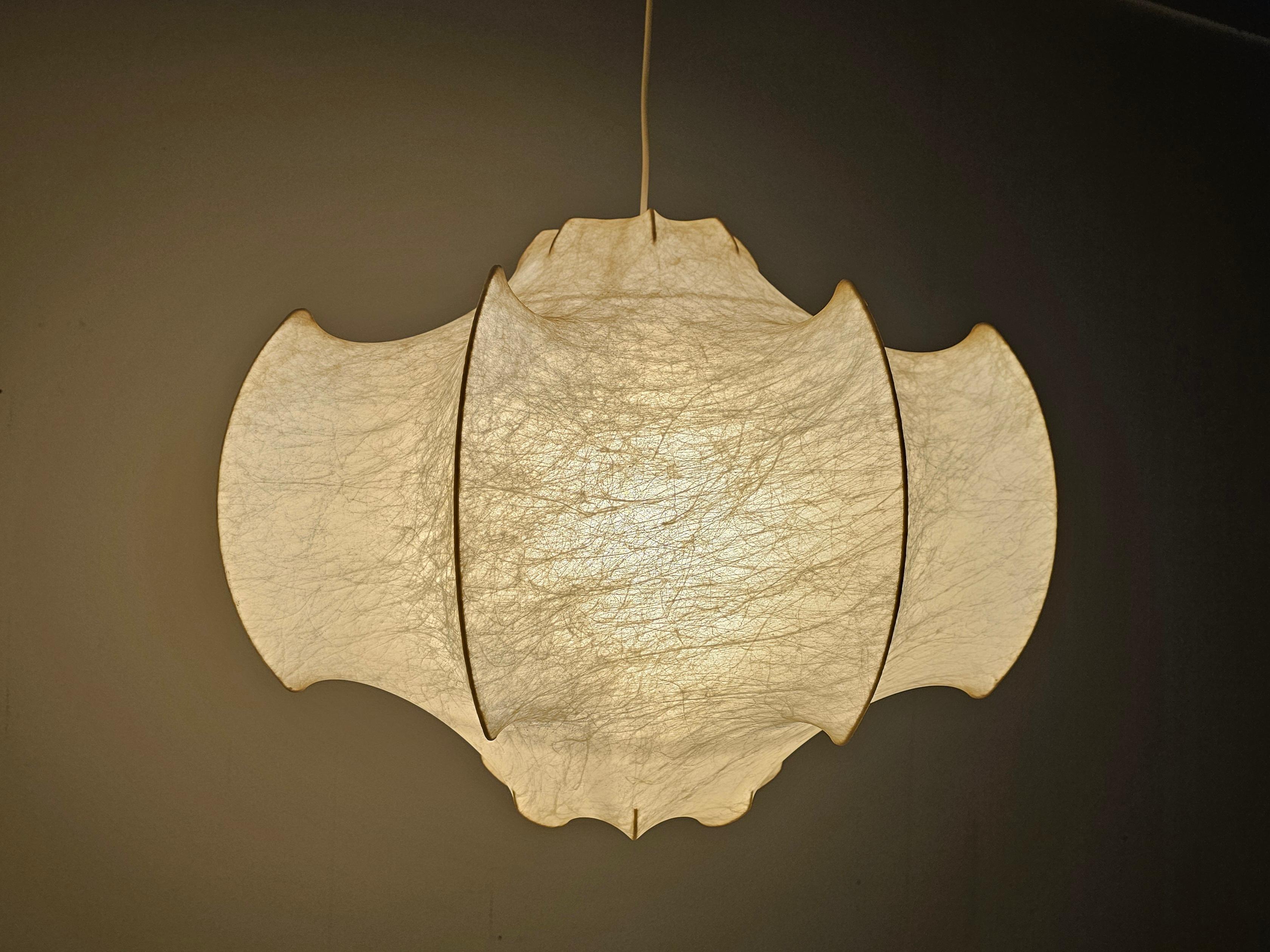 Iconic early edition 'Viscontea' Ceiling Lamp crafted by the legendary duo, Achille and Pier Giacomo Castiglioni for Flos in the 1960s. Embodying the essence of timeless elegance and artistic innovation, this vintage masterpiece exudes